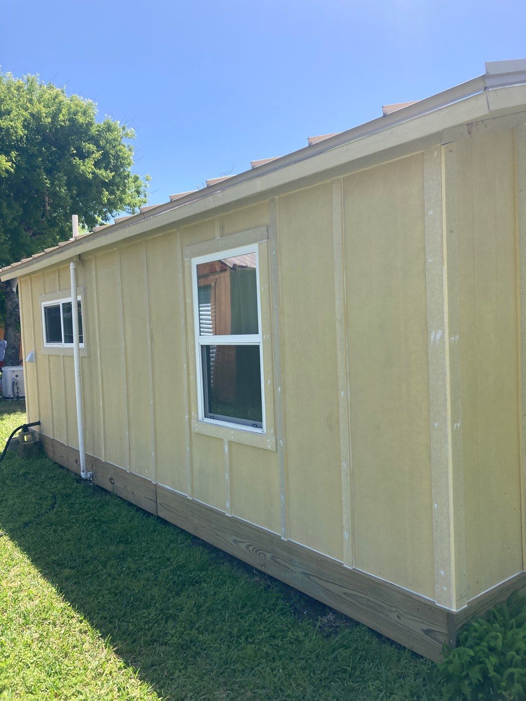 Vinyl to Hardie by Bayfront Roofing and Construction