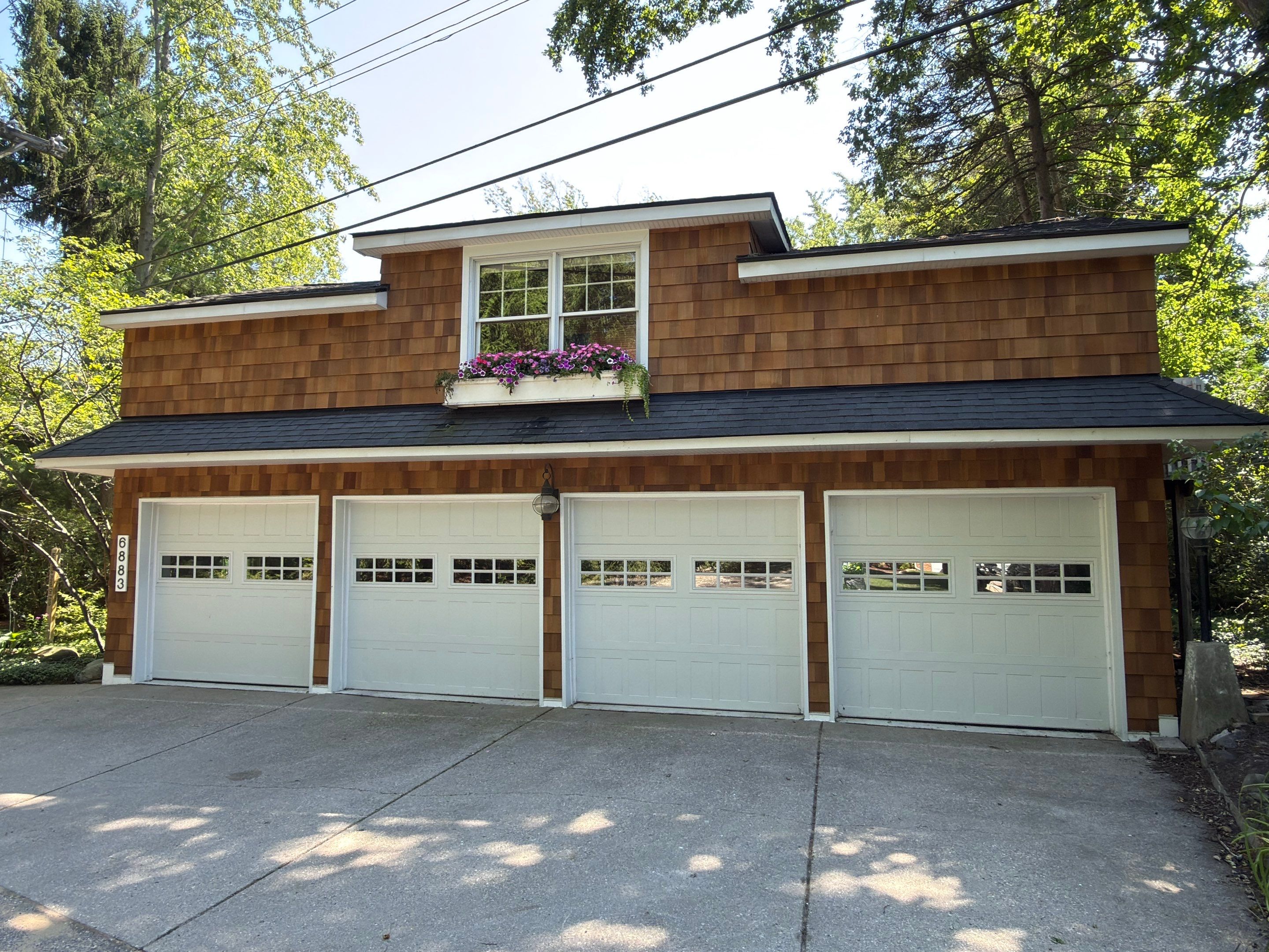 Cedar Siding Replacement  by Bloomfield Construction & Restoration