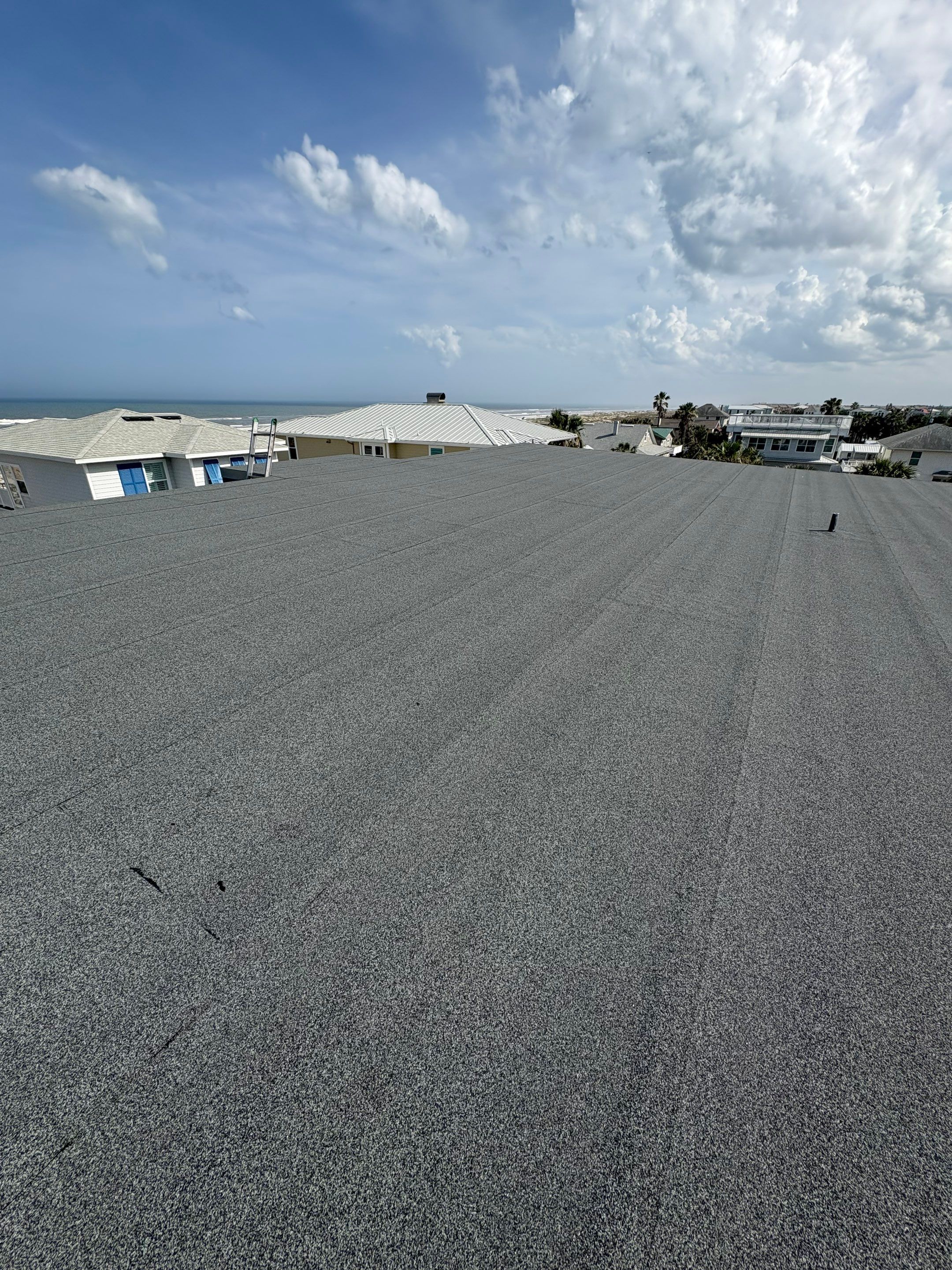 Flat Reroof Replacement St Augustine FL by Pinnacle Roofing Group