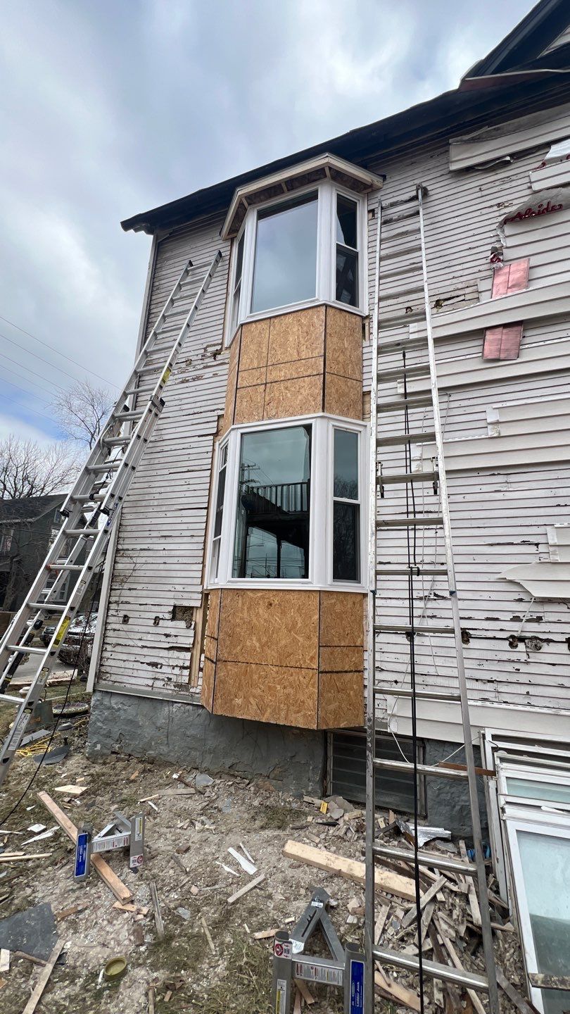 Adding Windows and installing Siding by Know-A-Guy Roofing & Exteriors