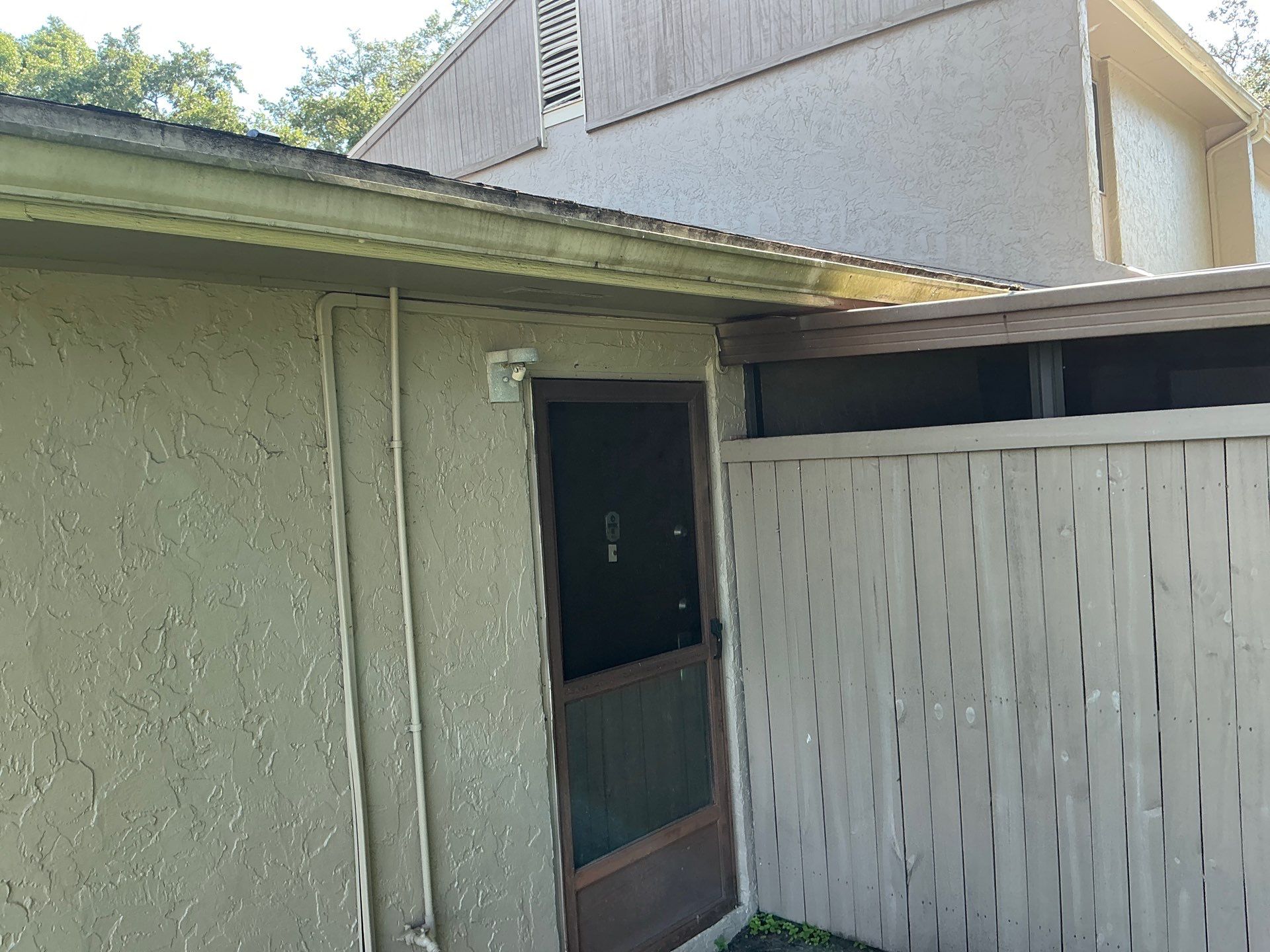 Professional Downspout Installation in Tampa, FL by Gutter Professor by Gutter Professors