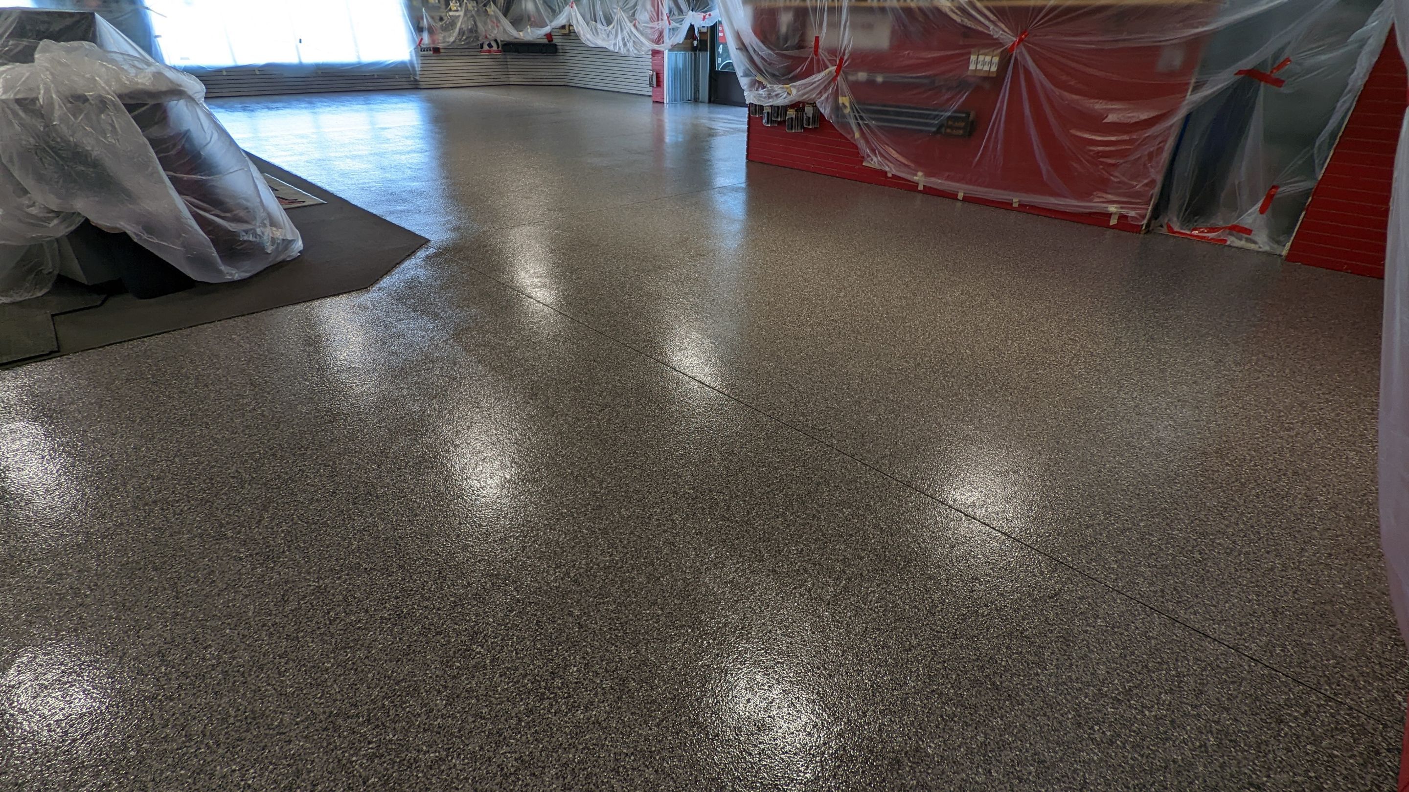 Commercial Showroom Transformation in Silvercreek by Croc Coatings, LLC