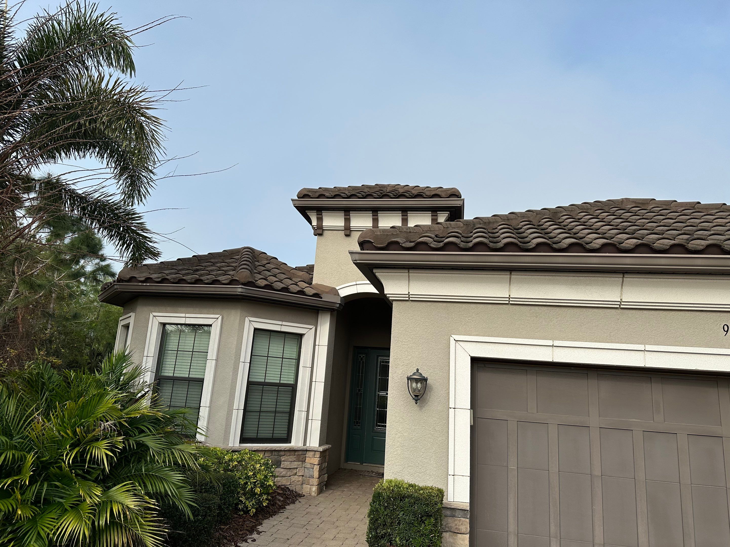 Concrete Tile Roof, Paver Pool Deck, Screen Enclosure & Driveway Cleaning in Artisan Lakes Esplanade, Palmetto, FL | Sunshine AquaWash by Sunshine AquaWash