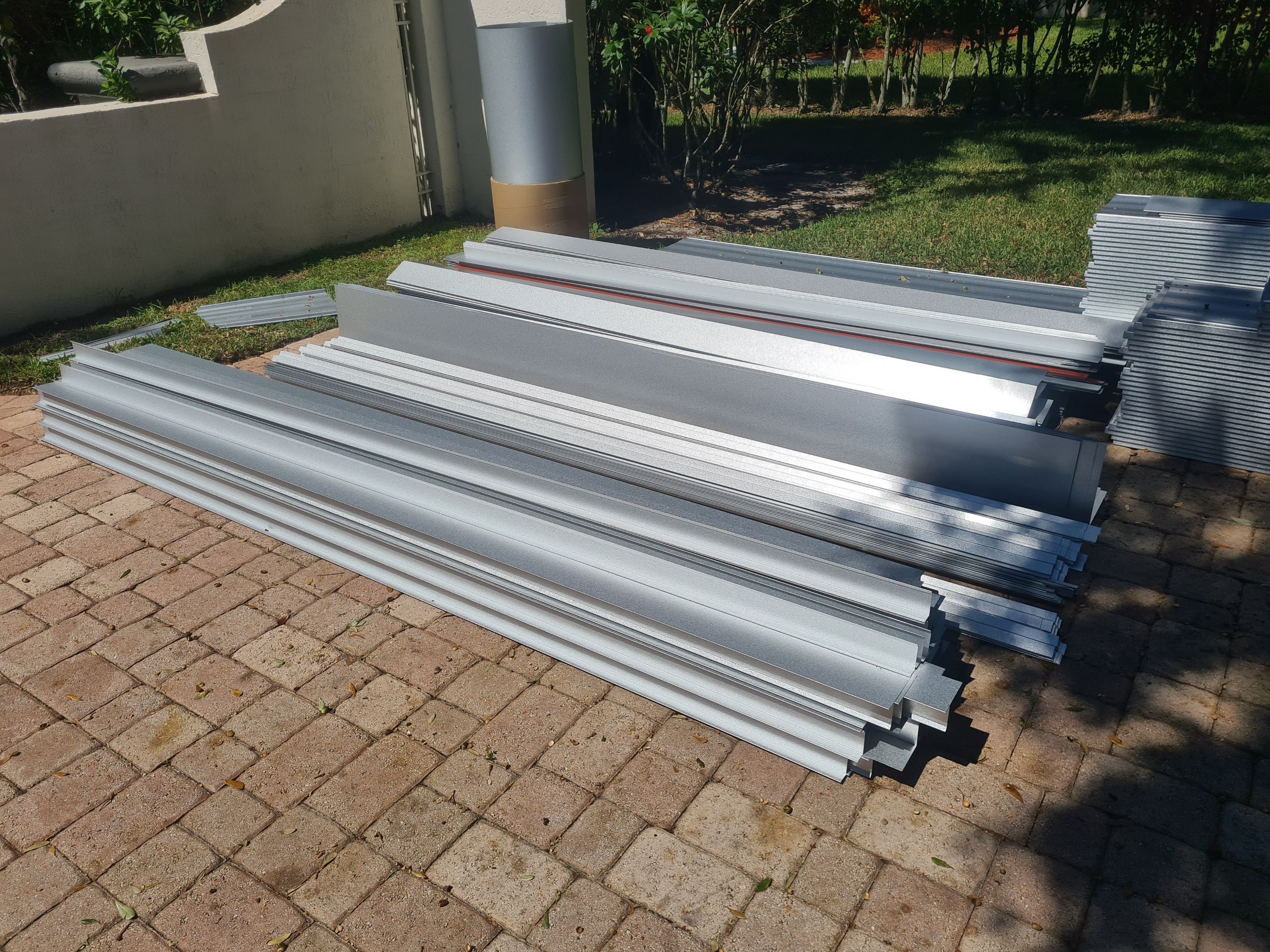 Residential Roofing Installation using Mil Finish-Unpainted by BLUES BROTHERS CONSTRUCTION CORP