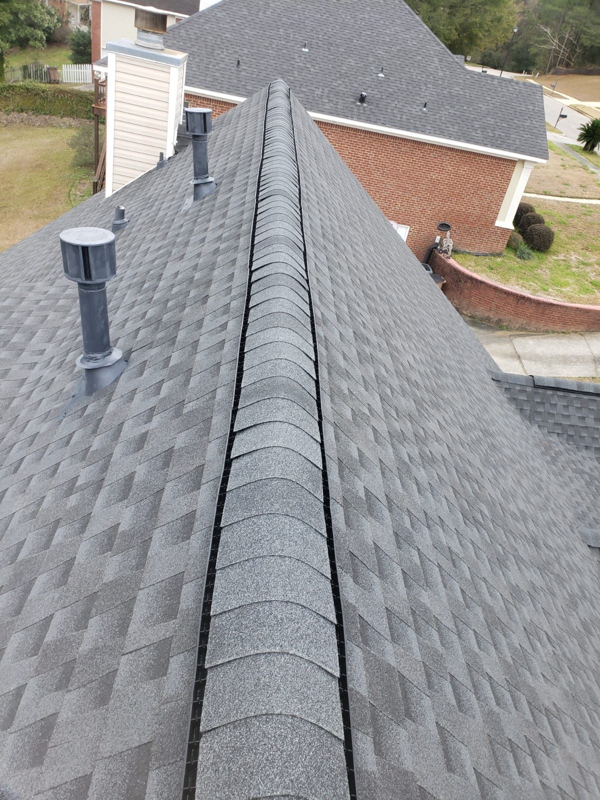 Residential Roofing Installation using Roof Replacement by American Roofing & Construction LLC