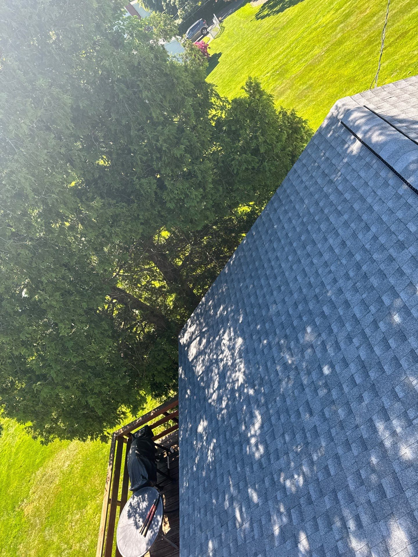 Beautiful new asphalt shingles on a roof in Vernon! by DiGiorgi Roofing and Siding Inc