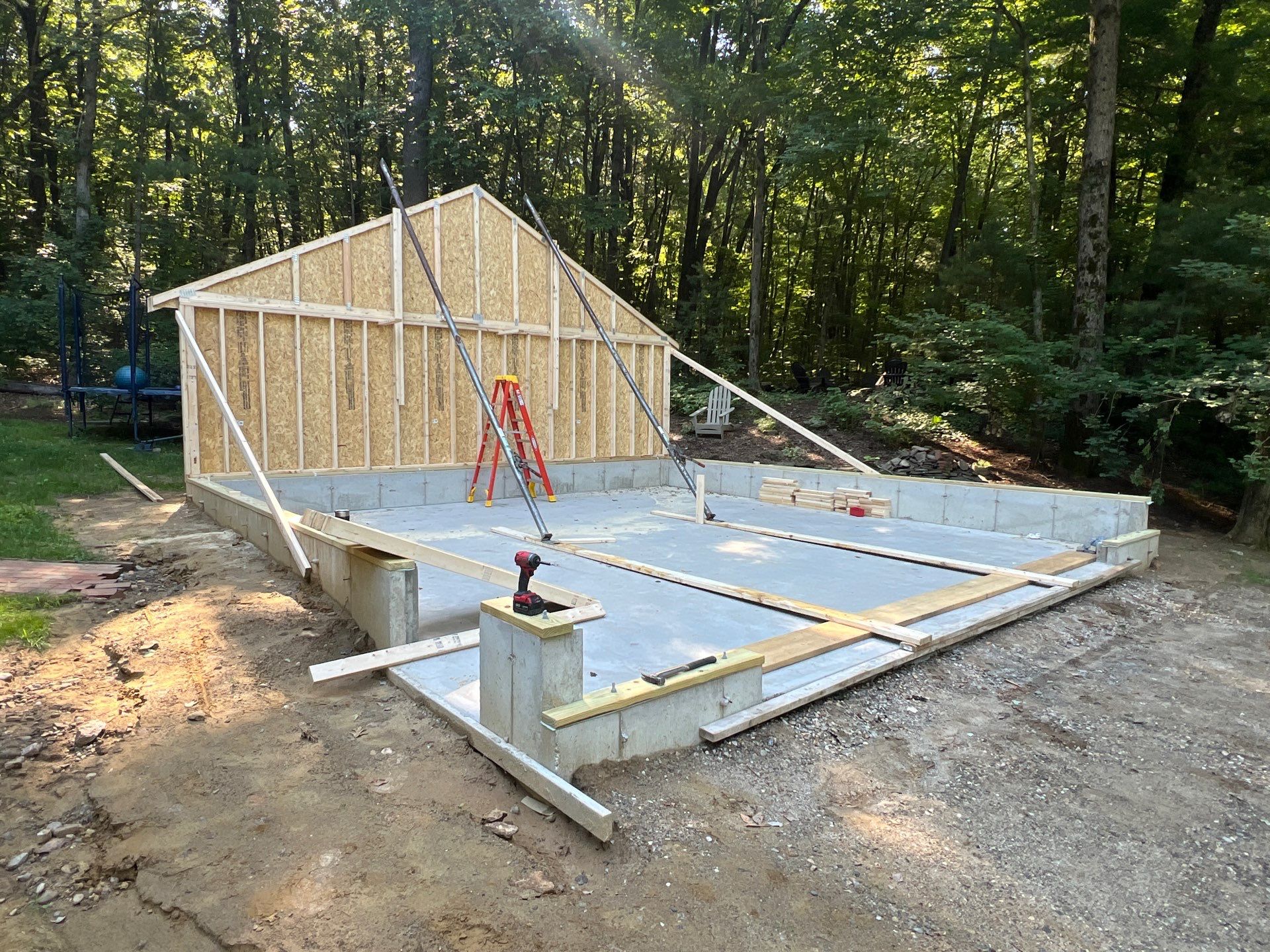 Garage using LP SmartSide Panel Siding by Chagnon Building & Remodeling LLC