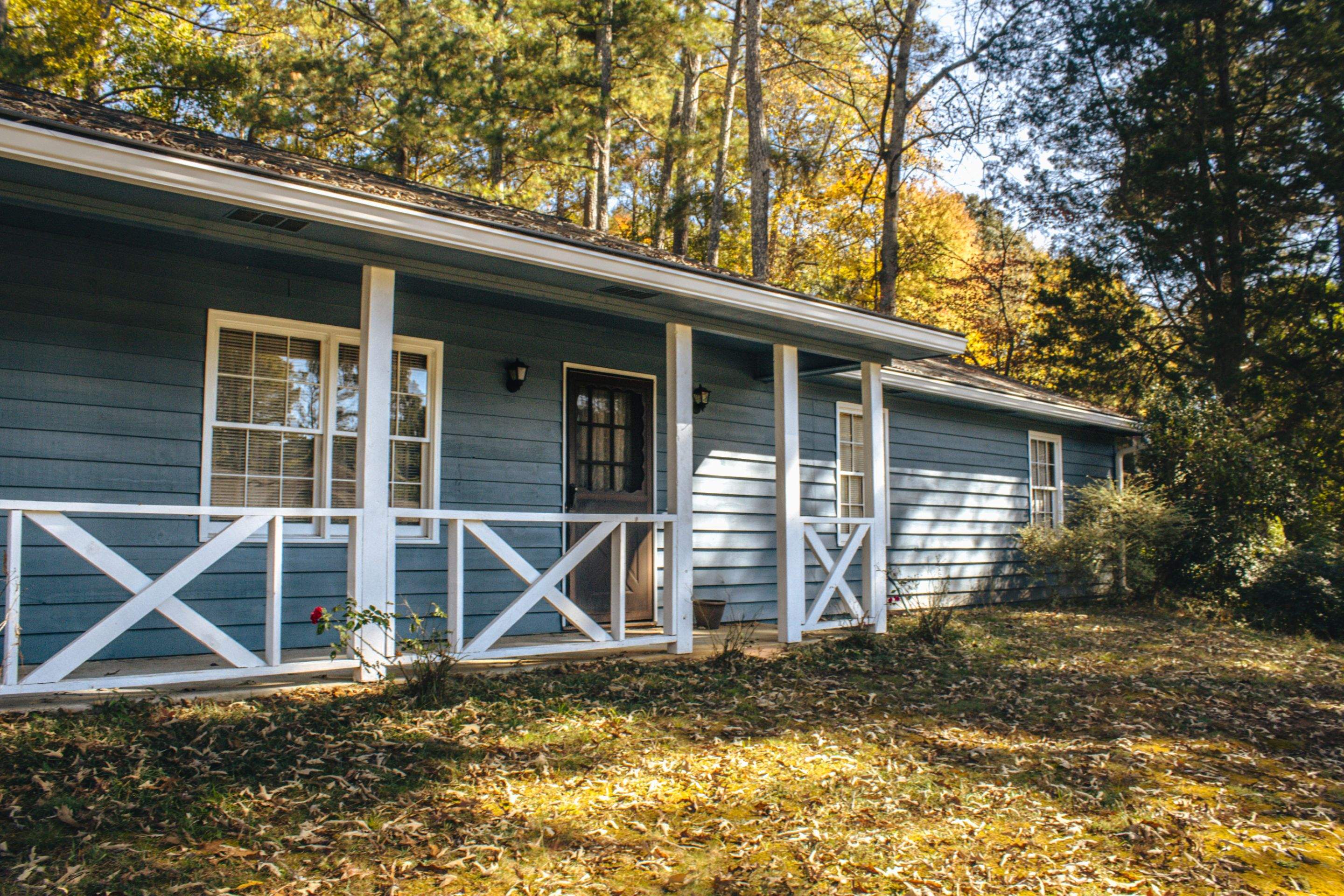 Marietta, GA Exterior Painting Transformation with Blue Paint by Nelson Exteriors