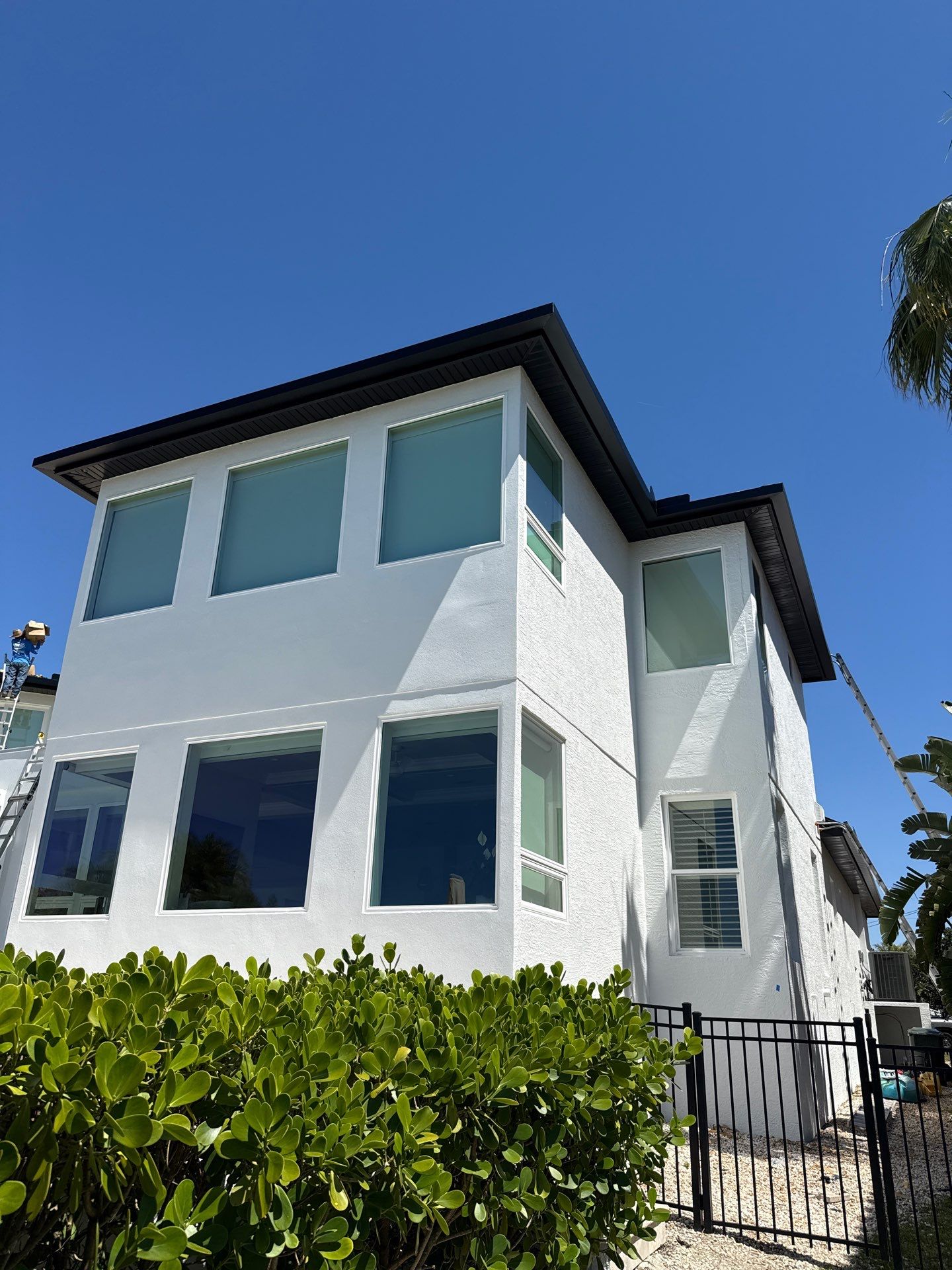 Soffit and Fascia Installation and black seamless gutters in Sarasota FL by Gutter Professors