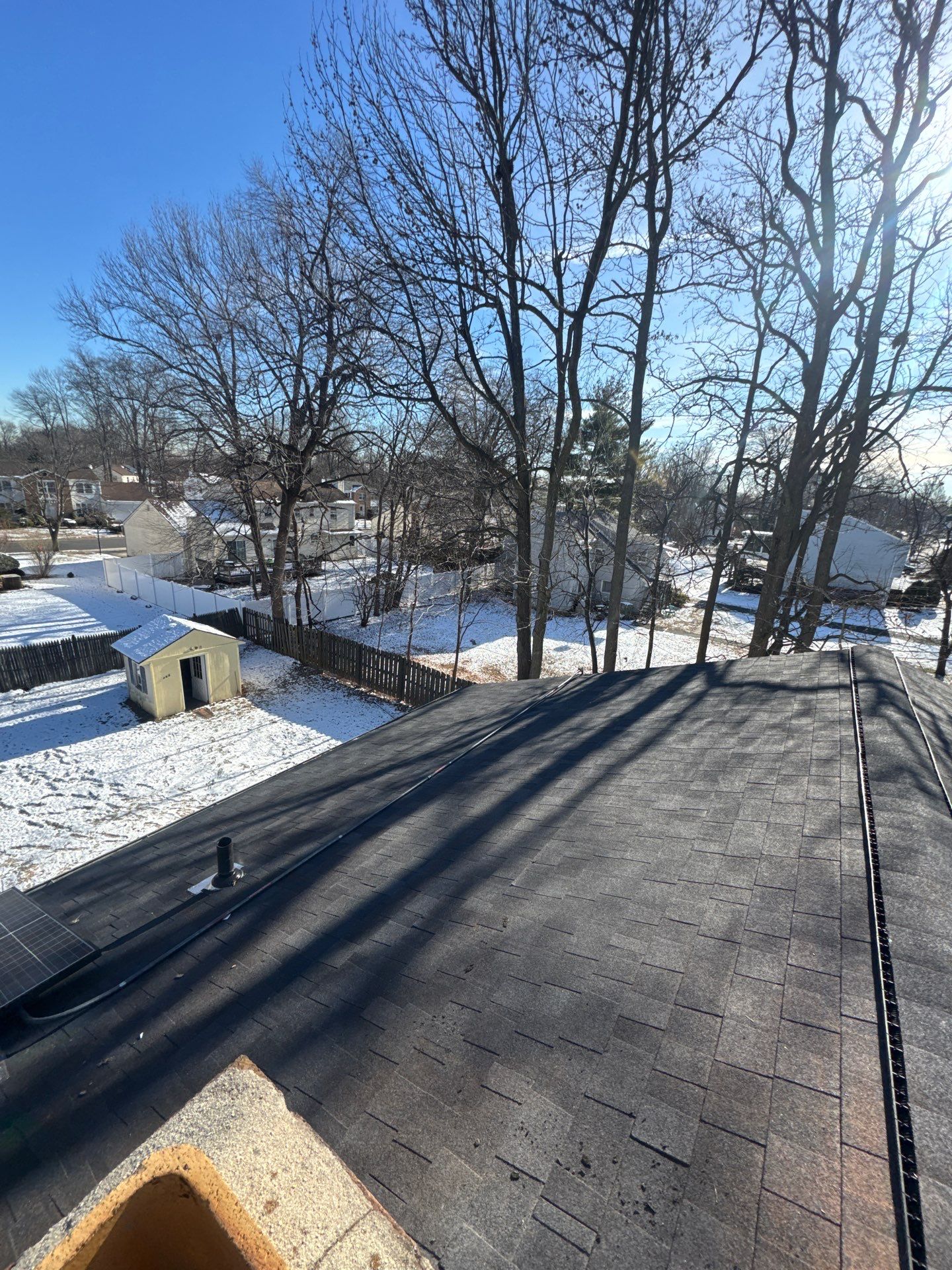 Onyx Black Shingles by Reimagine Roofing
