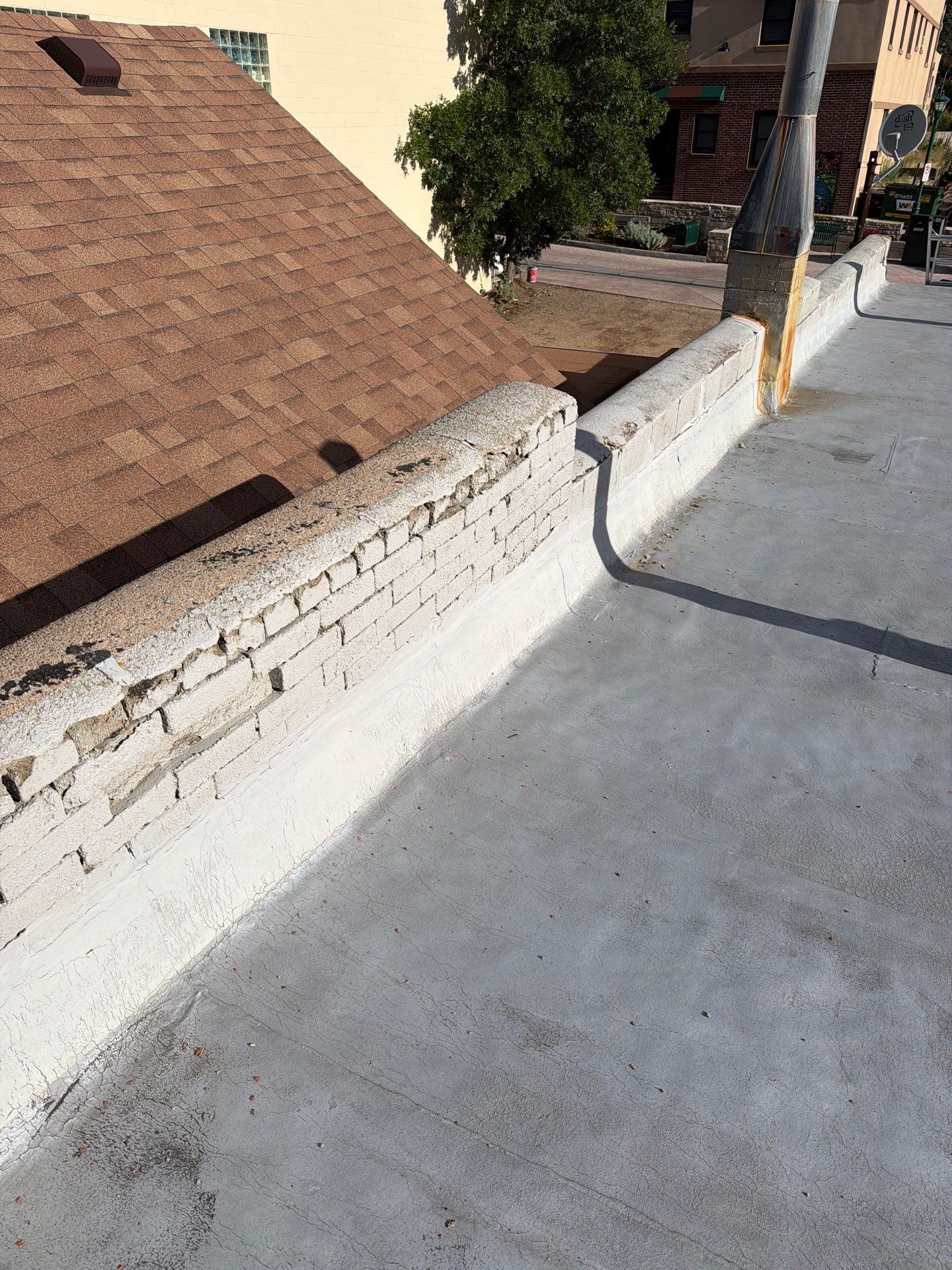 Estes Park "The Taffy Shop" Before & After Gaco Coating by Blue Peaks Roofing LLC