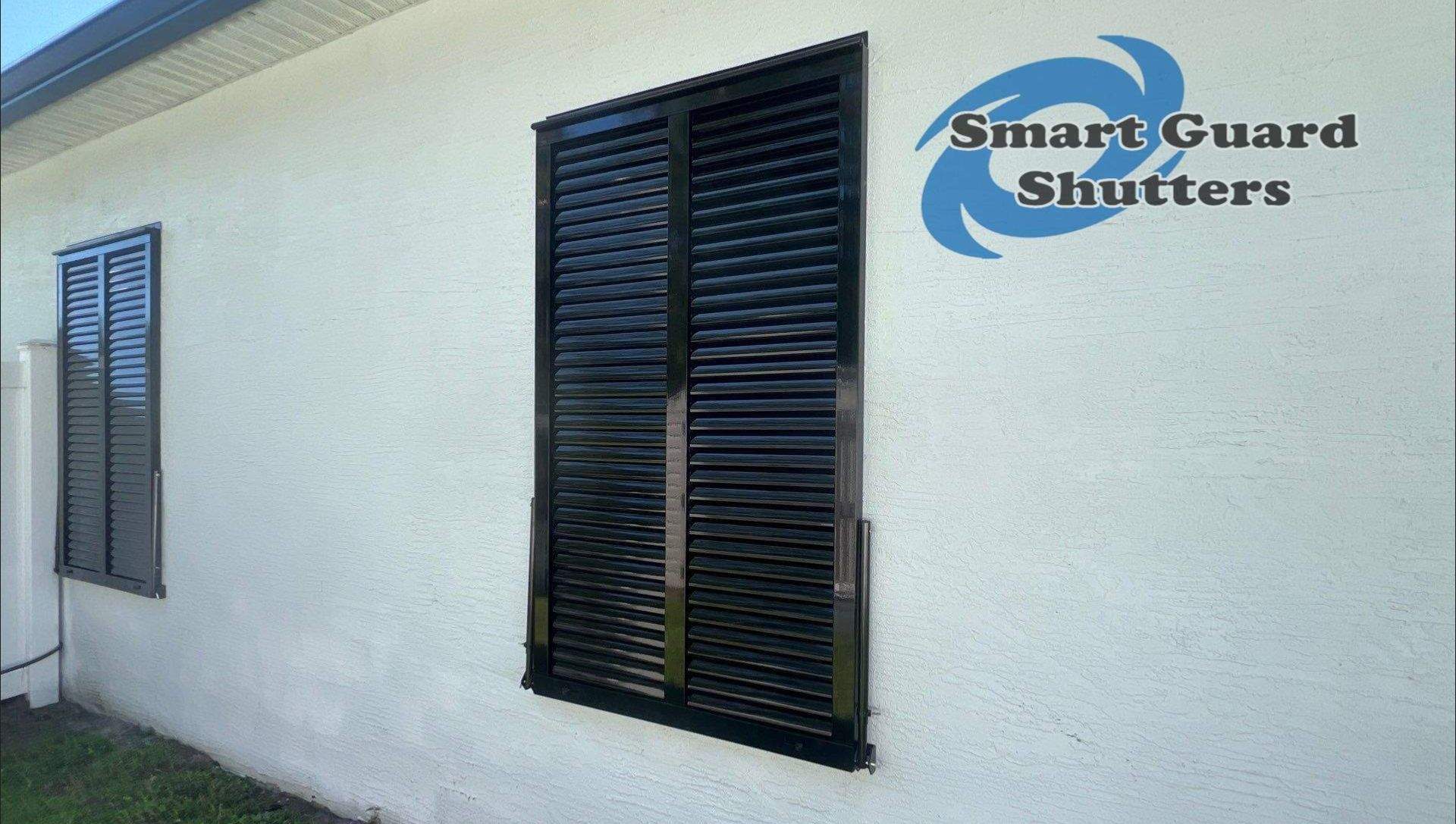 Impact Bahama Shutters in Jet Black by Smart Guard Shutters