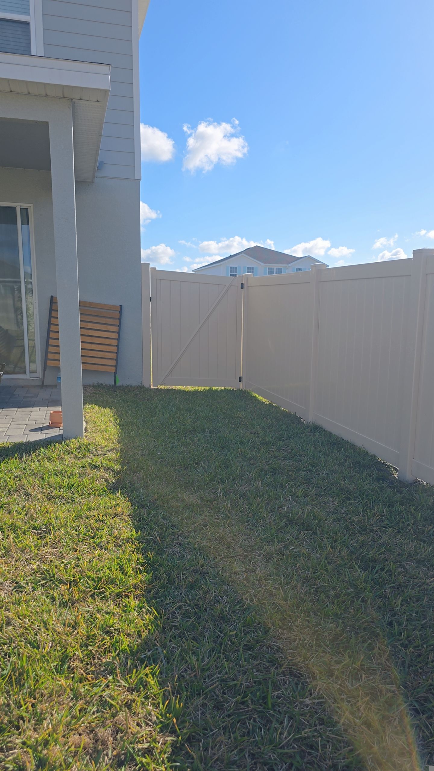 Tan Vinyl Fence in West Port by True Fence LLC