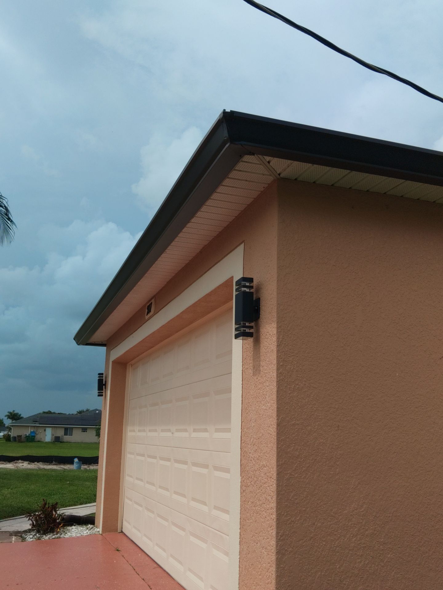 Downspout Installation for Multi-Story Homes in Cape Coral FL by Gutter Professors