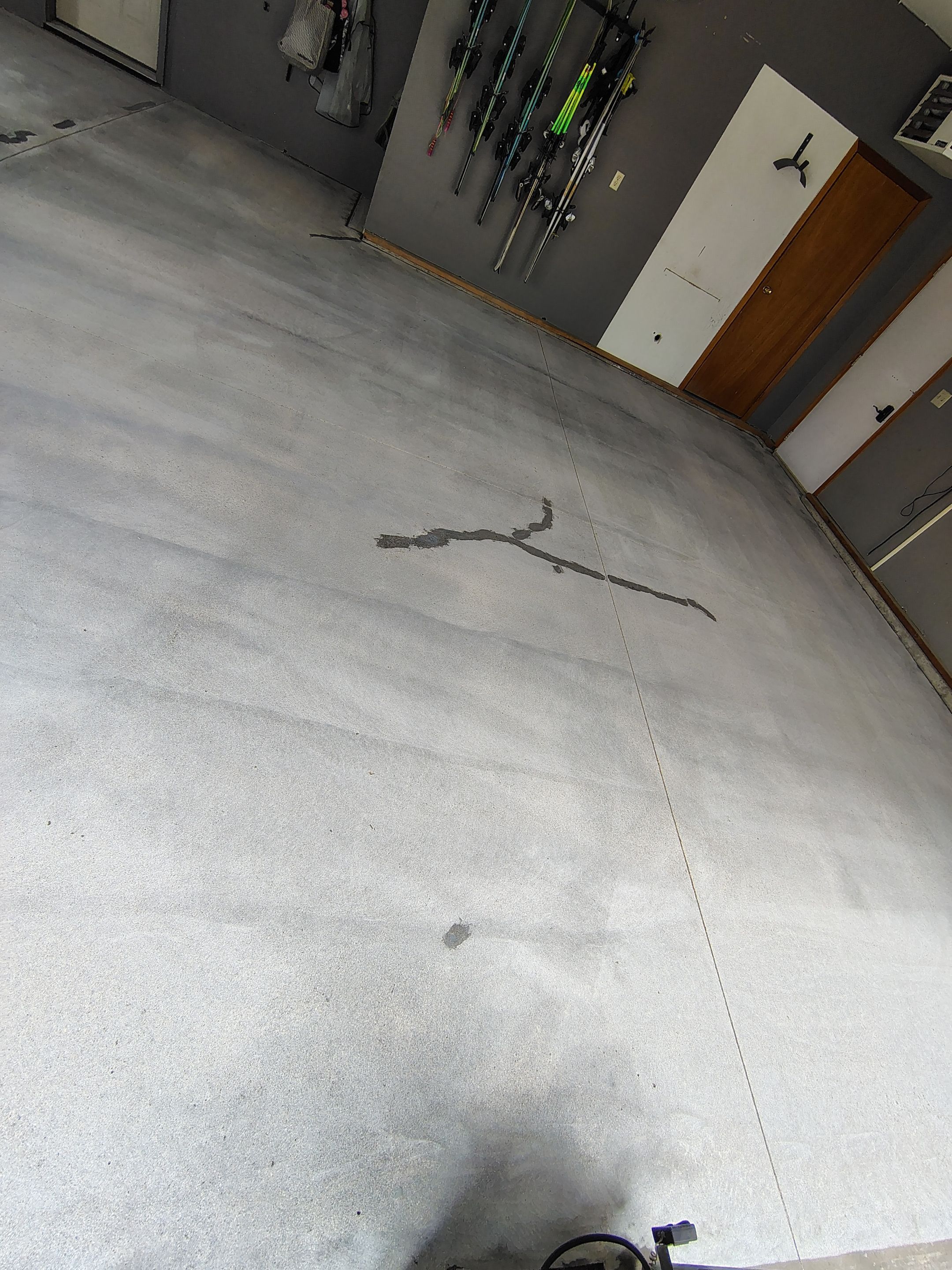 Garage Floor Concrete Coating and Crack Repair in Sioux Falls by Select Painting, Coatings & Garage Cabinets