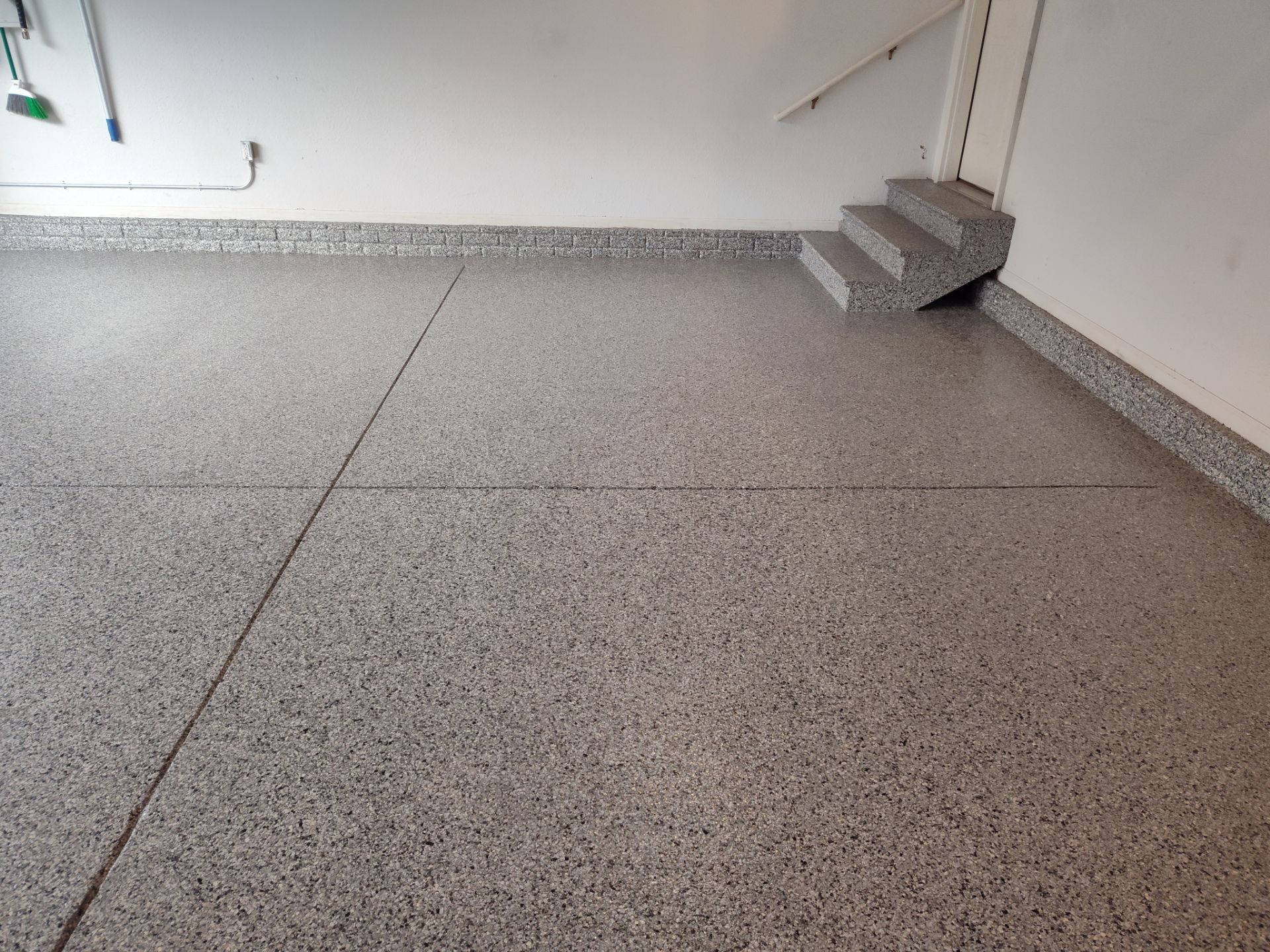 A Garage In One Day Keeps the Rock Salt Away! by Revival Concrete Coatings