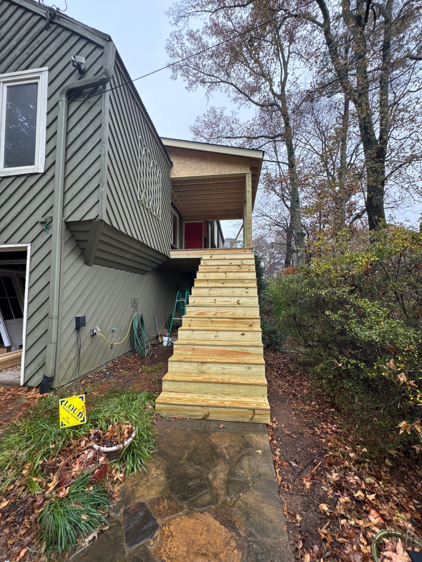 Elevated Wood Deck and Siding Replacement in Marietta by Swift Home Renovations