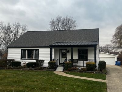 Siding Replacement using CertainTeed Monogram vinyl in Colonial White & Front Porch Remodel