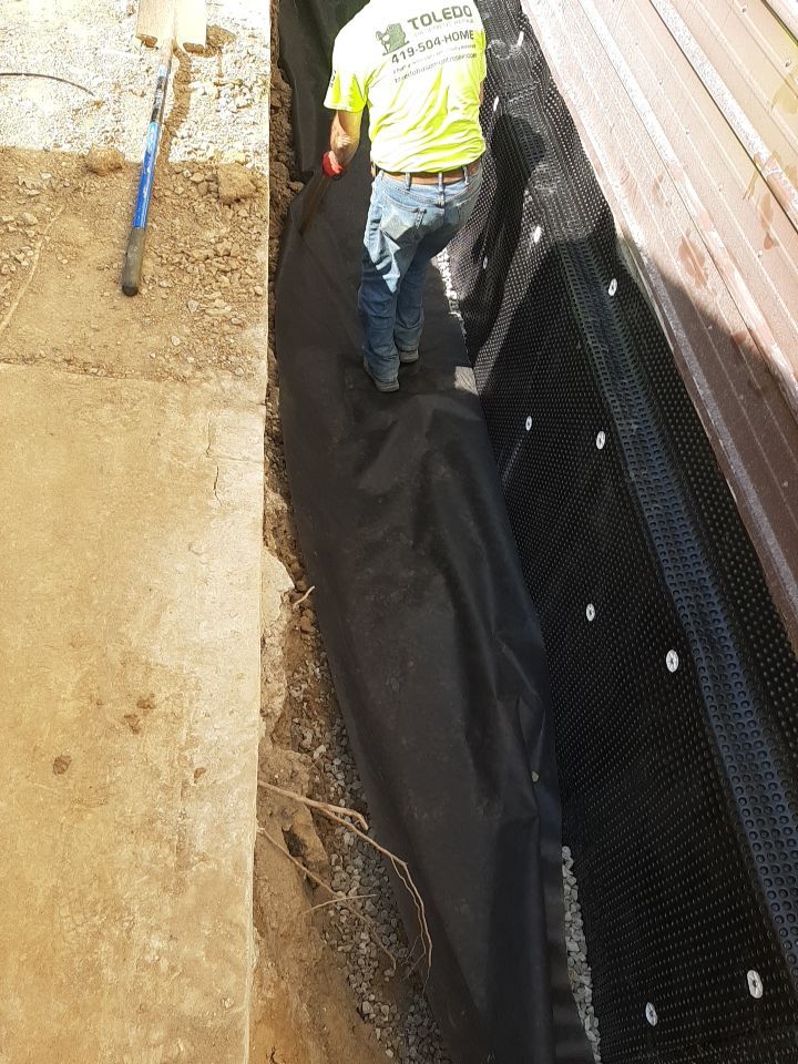 Exterior Deep Waterproofing System with Wall Push Back and Steel Beams Reinforcement by Toledo Basement Repair