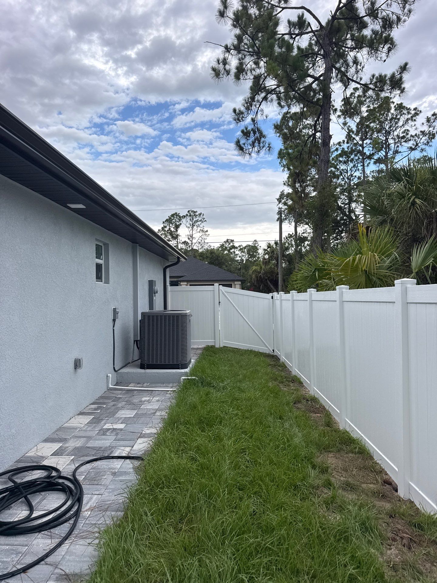 White Vinyl Privacy Fence Installation in North Port by True Fence LLC