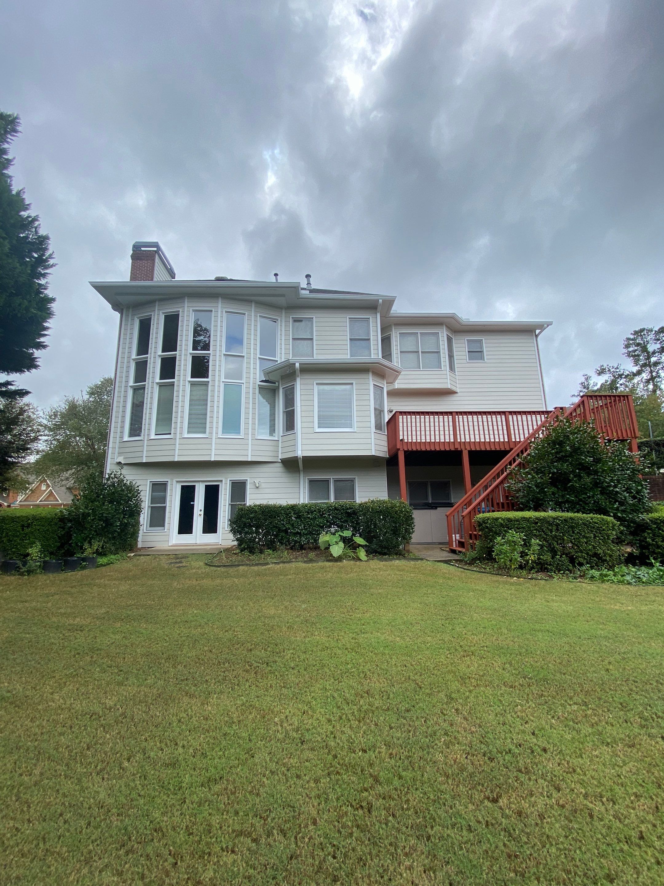 Exterior Painting and Trim Refresh for Duluth Brick Home by Swift Home Renovations