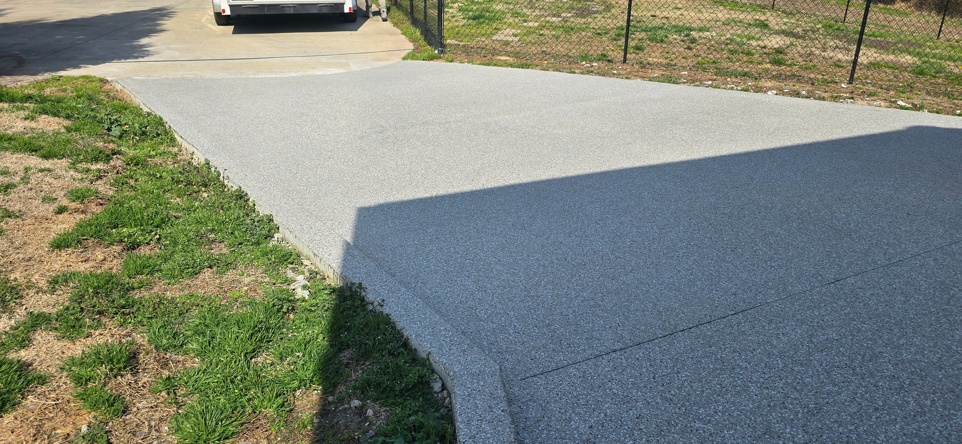 Driveway using Creekbed by Elite Floor Solutions