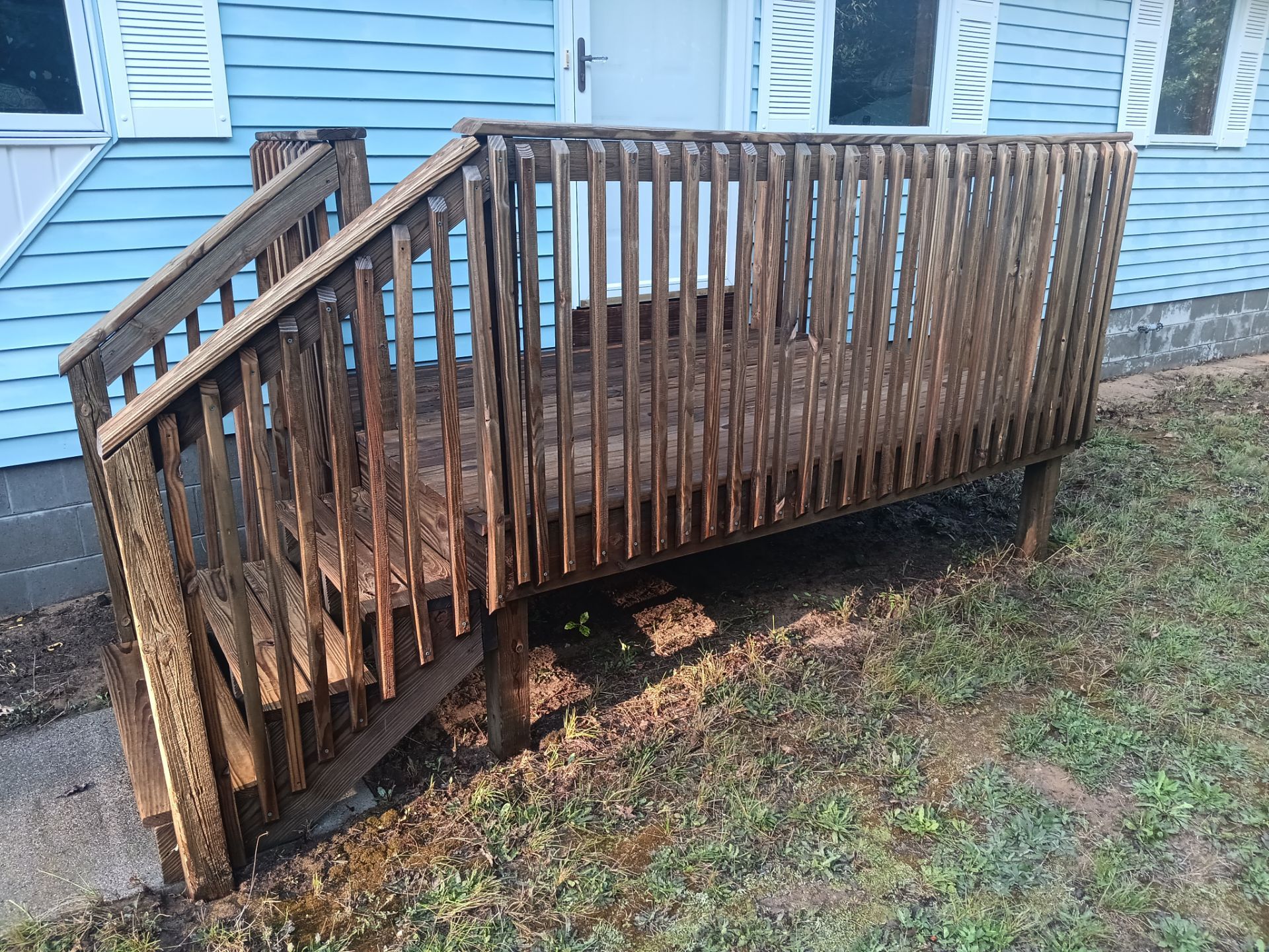 Deck staining and exterior foundation painting! by Gordon Painting