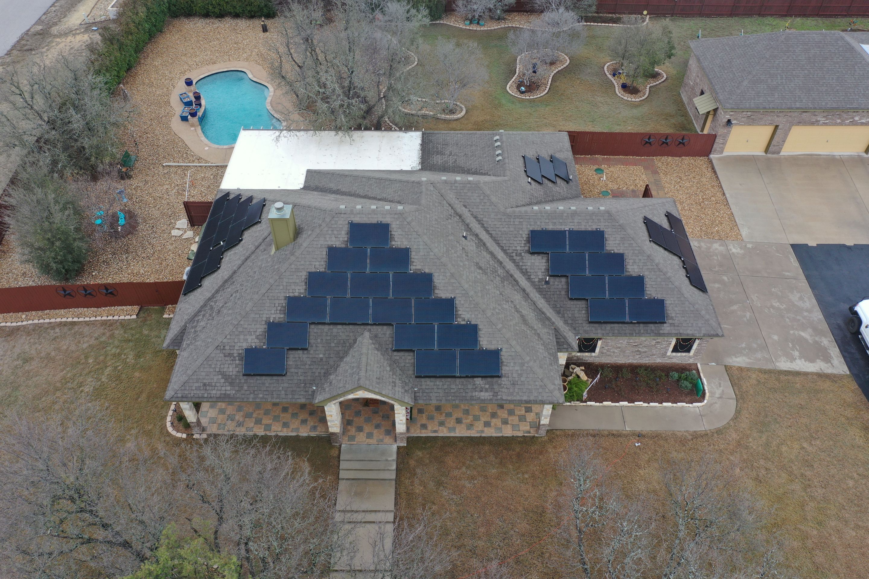 Residential Roof Replacement with Owens Corning - Duration - Sedona Canyon by Action Exteriors Austin