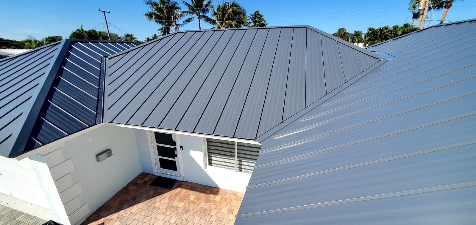 Residential Roofing Installation using 1" Nail strip metal roof by BLUES BROTHERS ROOFING