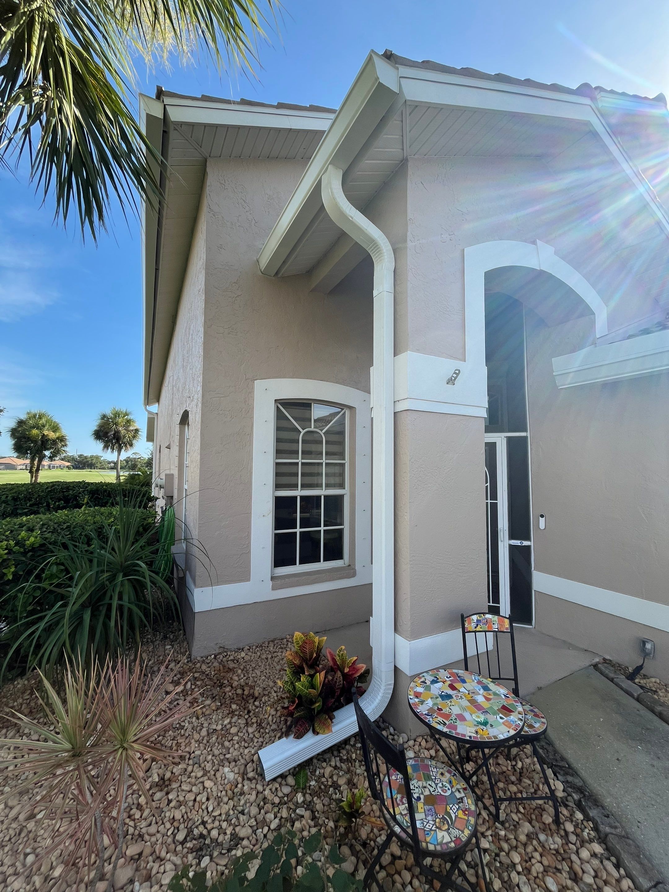 Replace White Seamless Gutters Installation in Sarasota FL by Gutter Professors