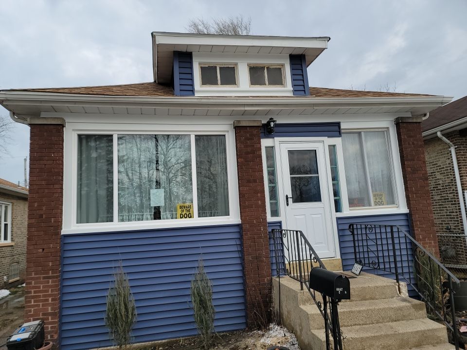 Window Installation using vinyl windows by Kraz Construction