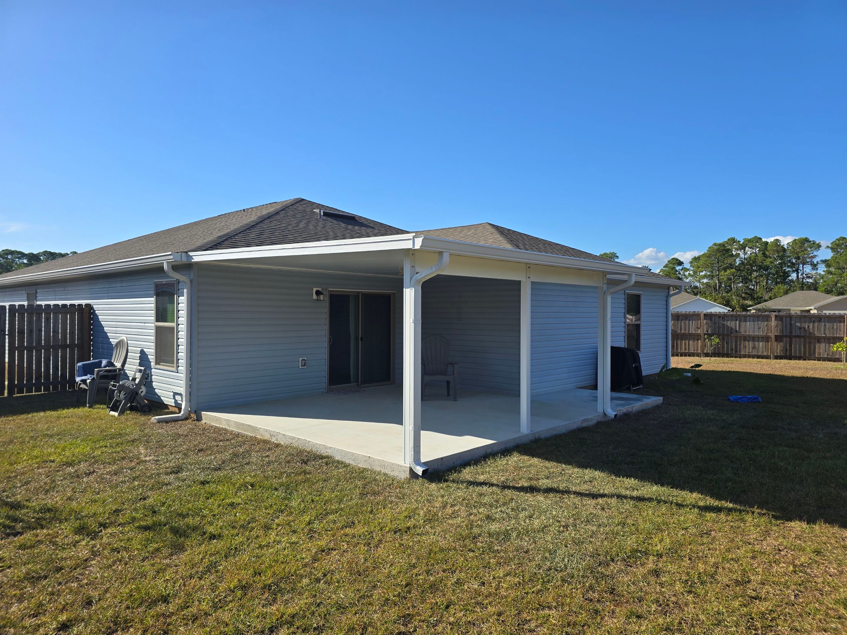 Backyard Patio Cover by Titan Sunrooms