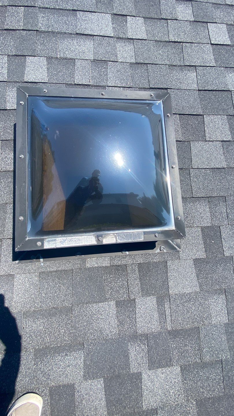 Nothing looks nicer than a little black roof by Bayfront Roofing and Construction