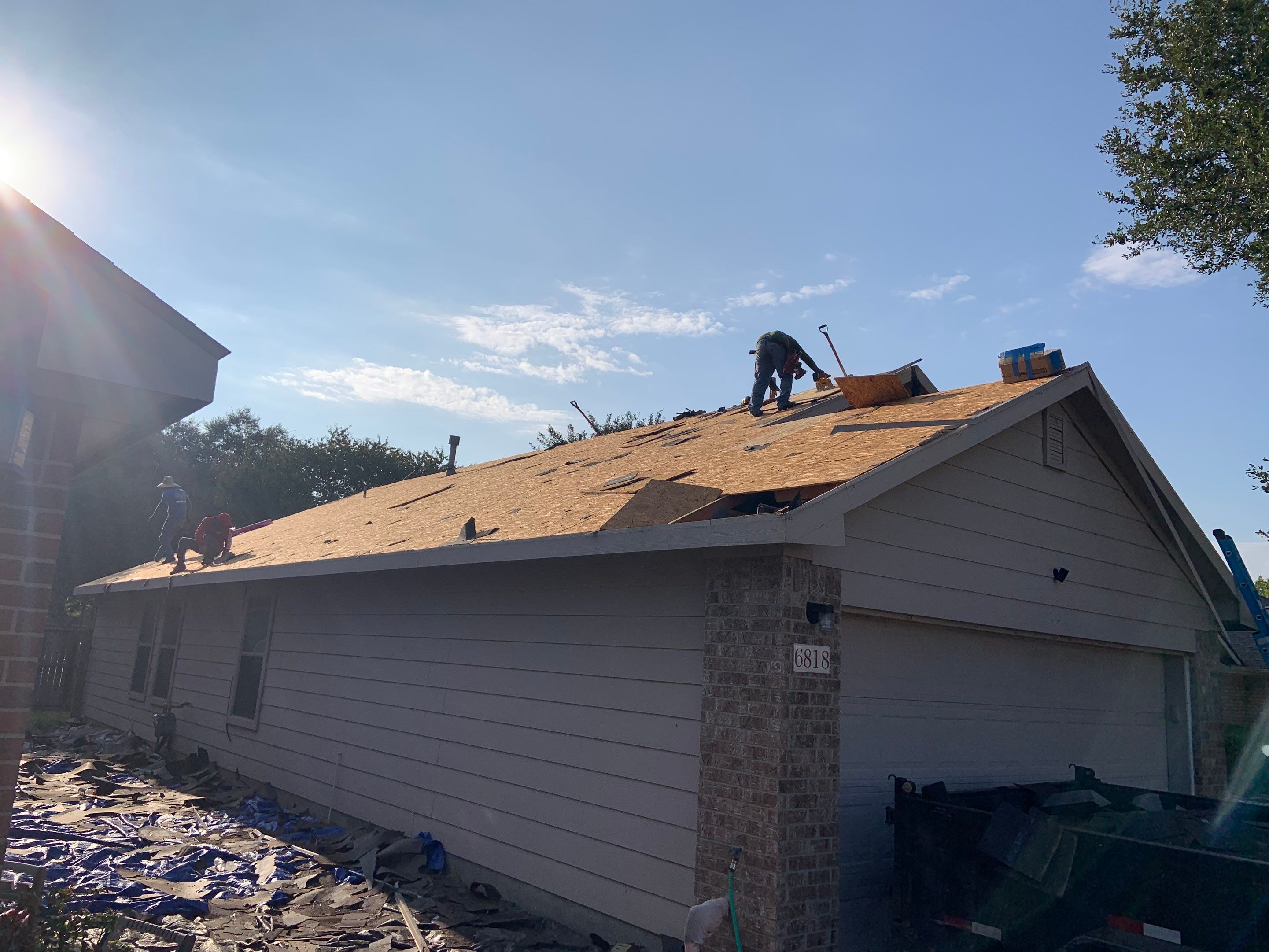 AMIG approved this roof for wind damage, fascia painting, and window work. by Roof Repair Company