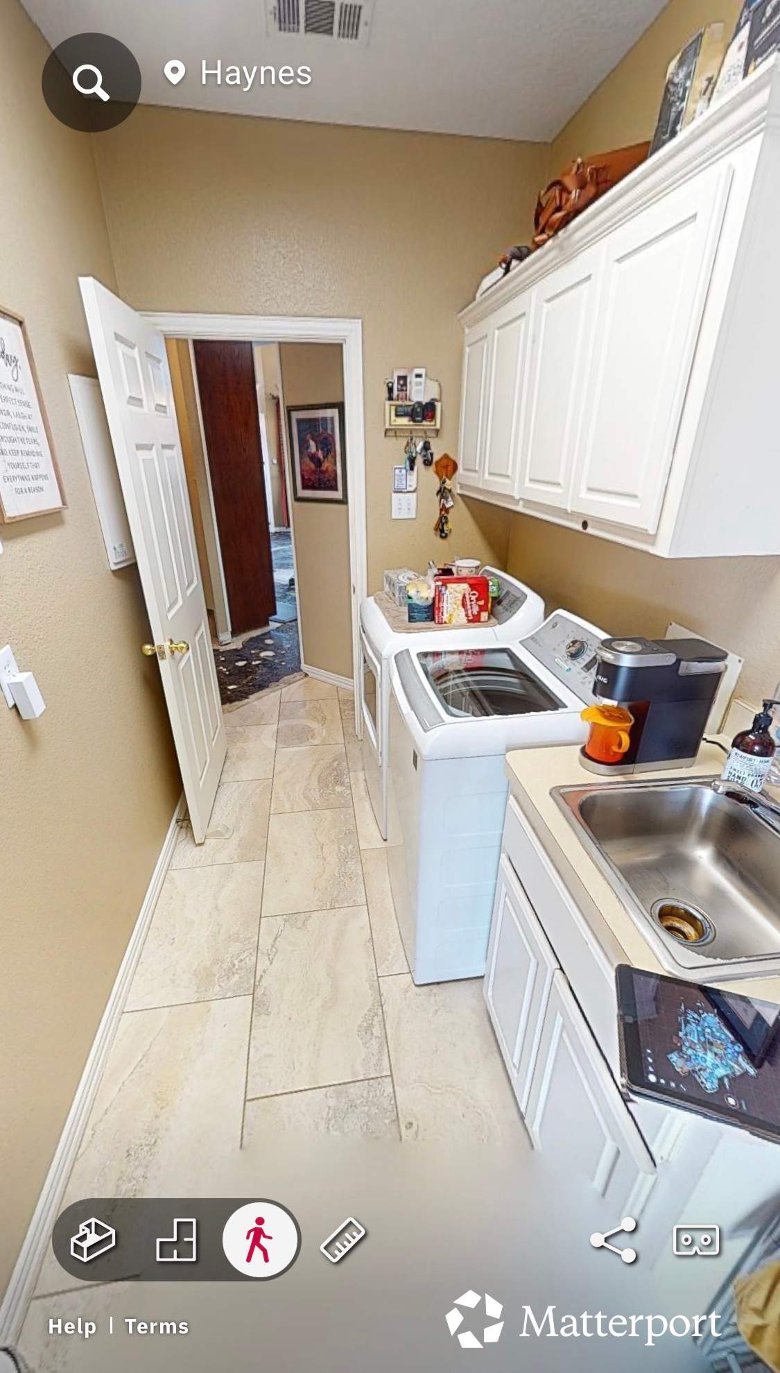 Modern Laundry Room in Trophy Club by Simmons Floors 