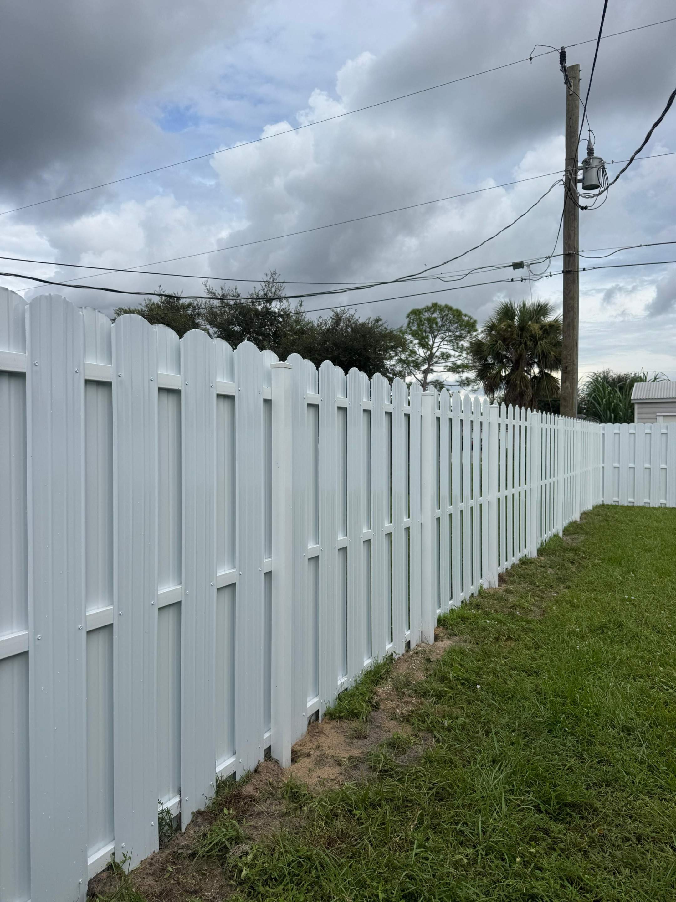 White Vinyl Privacy Fence Installation in North Port by True Fence LLC