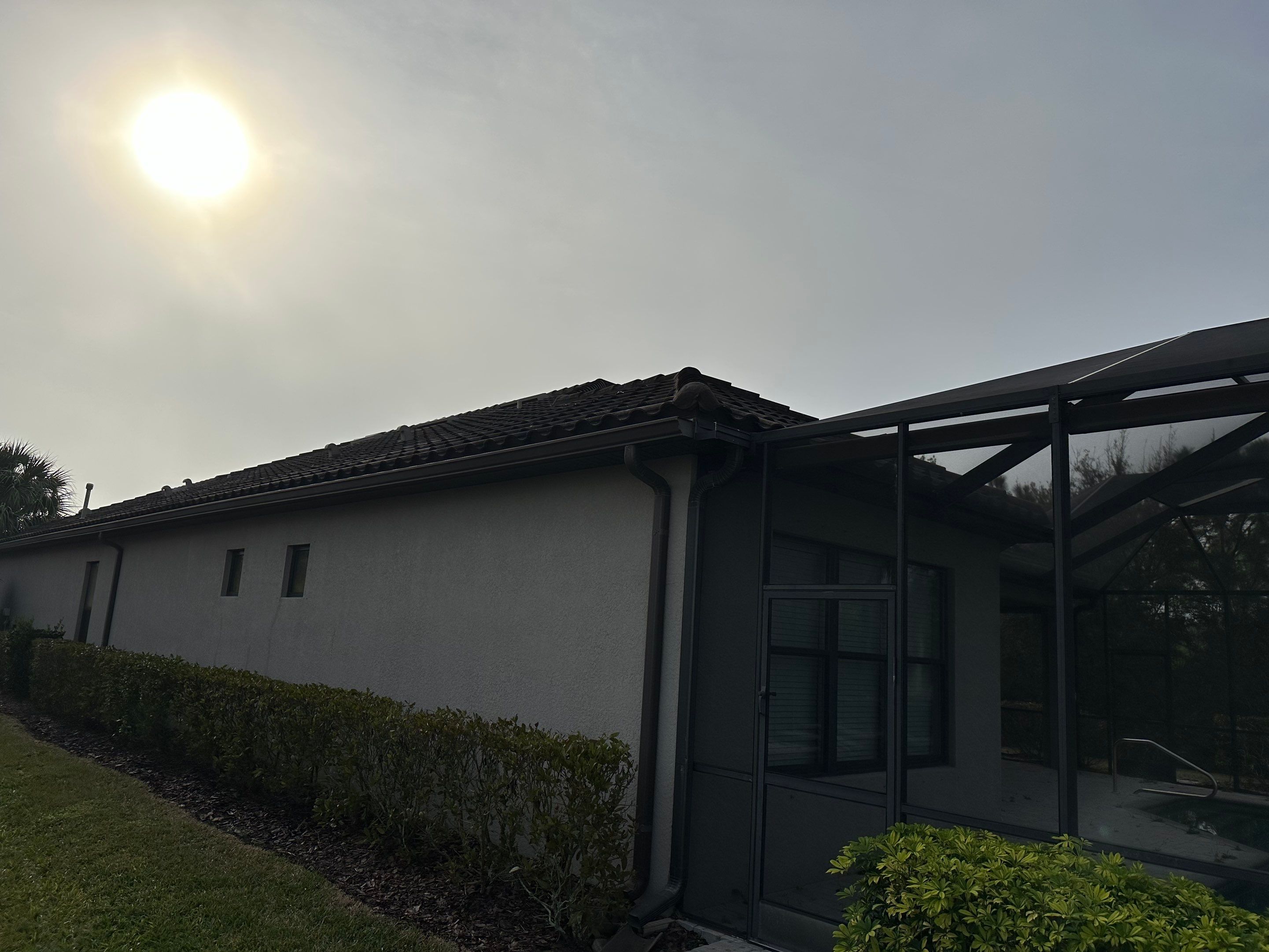 Concrete Tile Roof, Paver Pool Deck, Screen Enclosure & Driveway Cleaning in Artisan Lakes Esplanade, Palmetto, FL | Sunshine AquaWash by Sunshine AquaWash