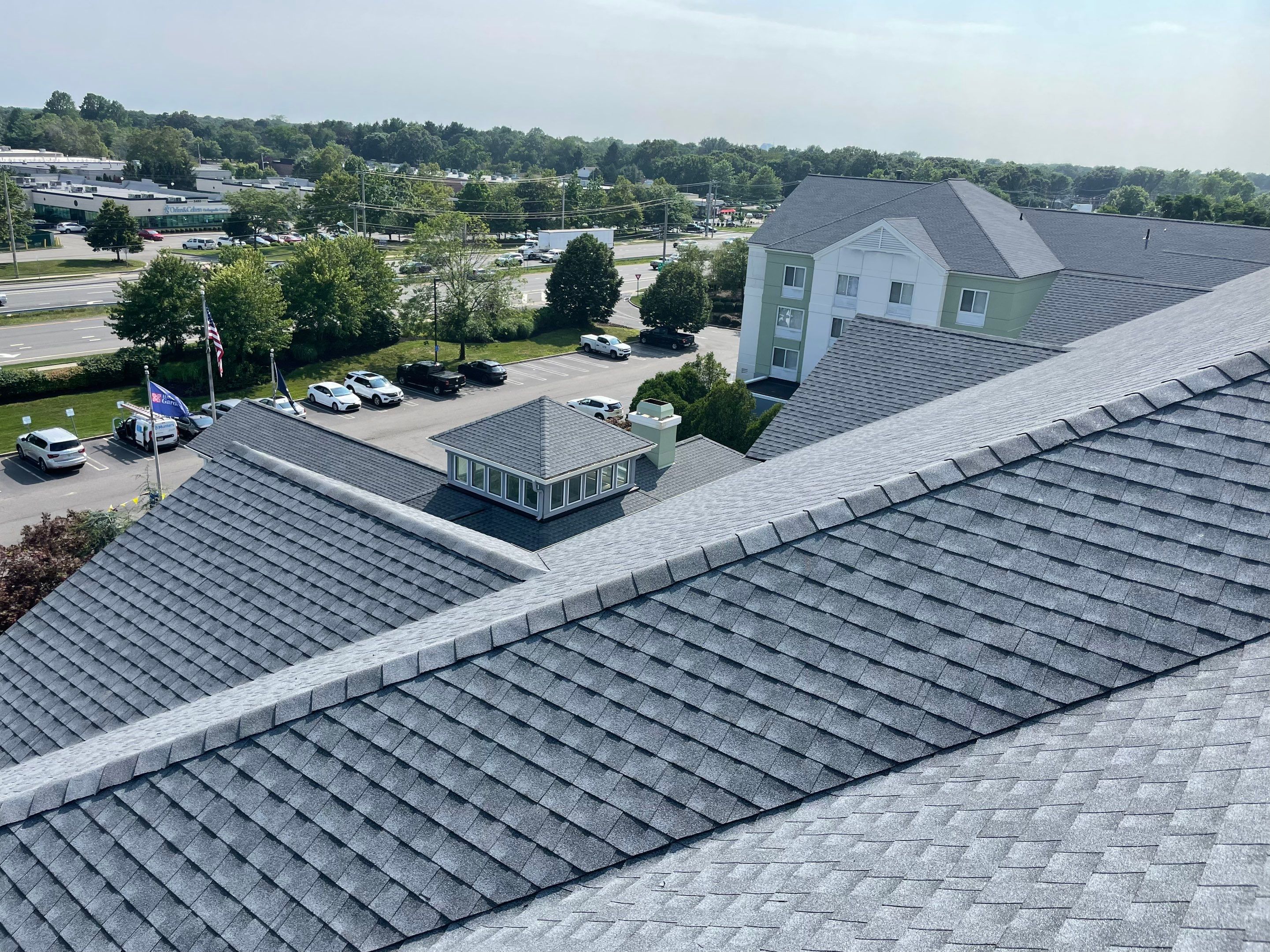 Commercial Roofing Installation using GAF Timberline / New Gutters and Downspouts by All Site Roofing