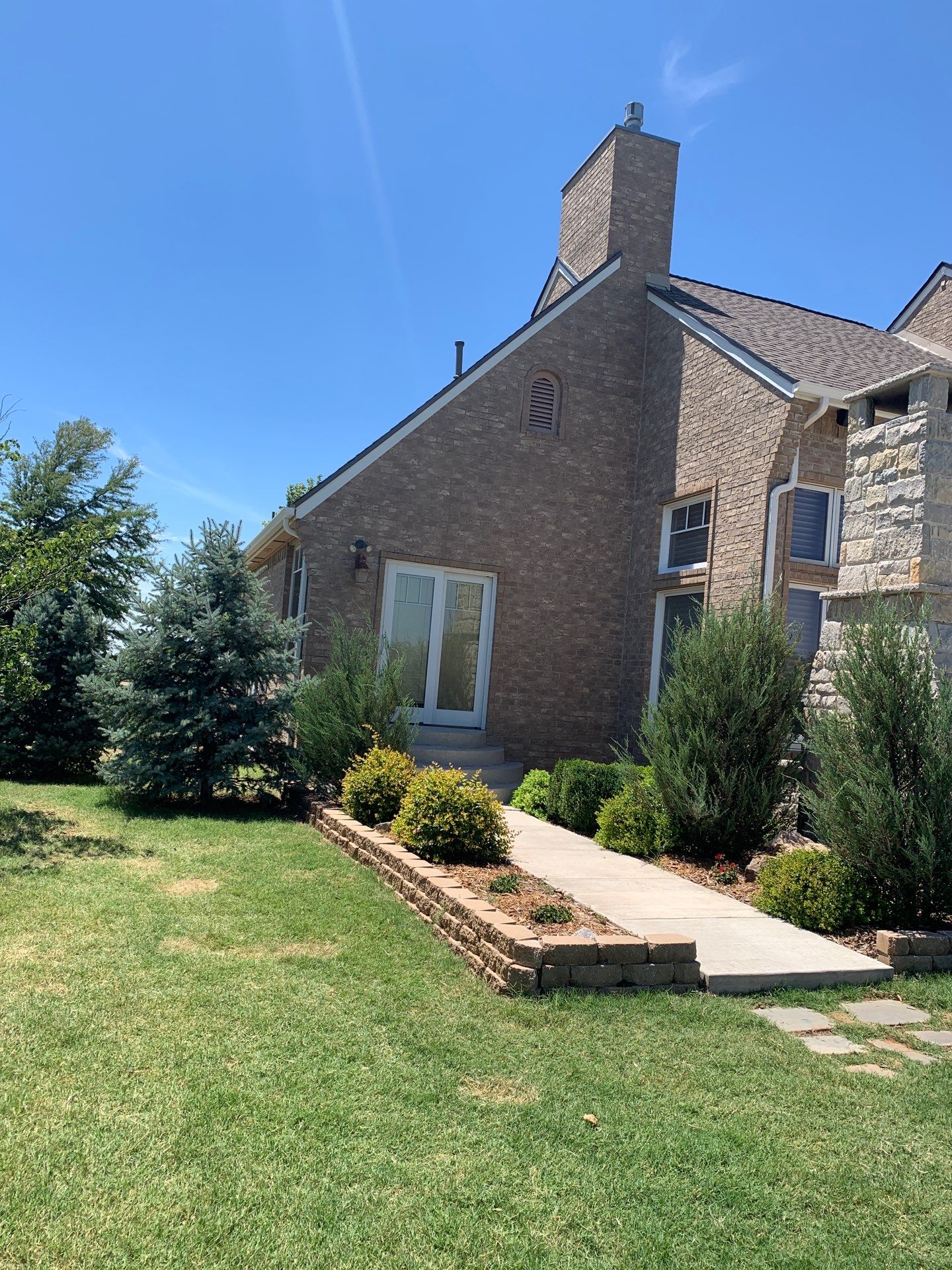 Roof Replacement and Gutter Installation in Edmond, OK by McCann's Roofing and Construction