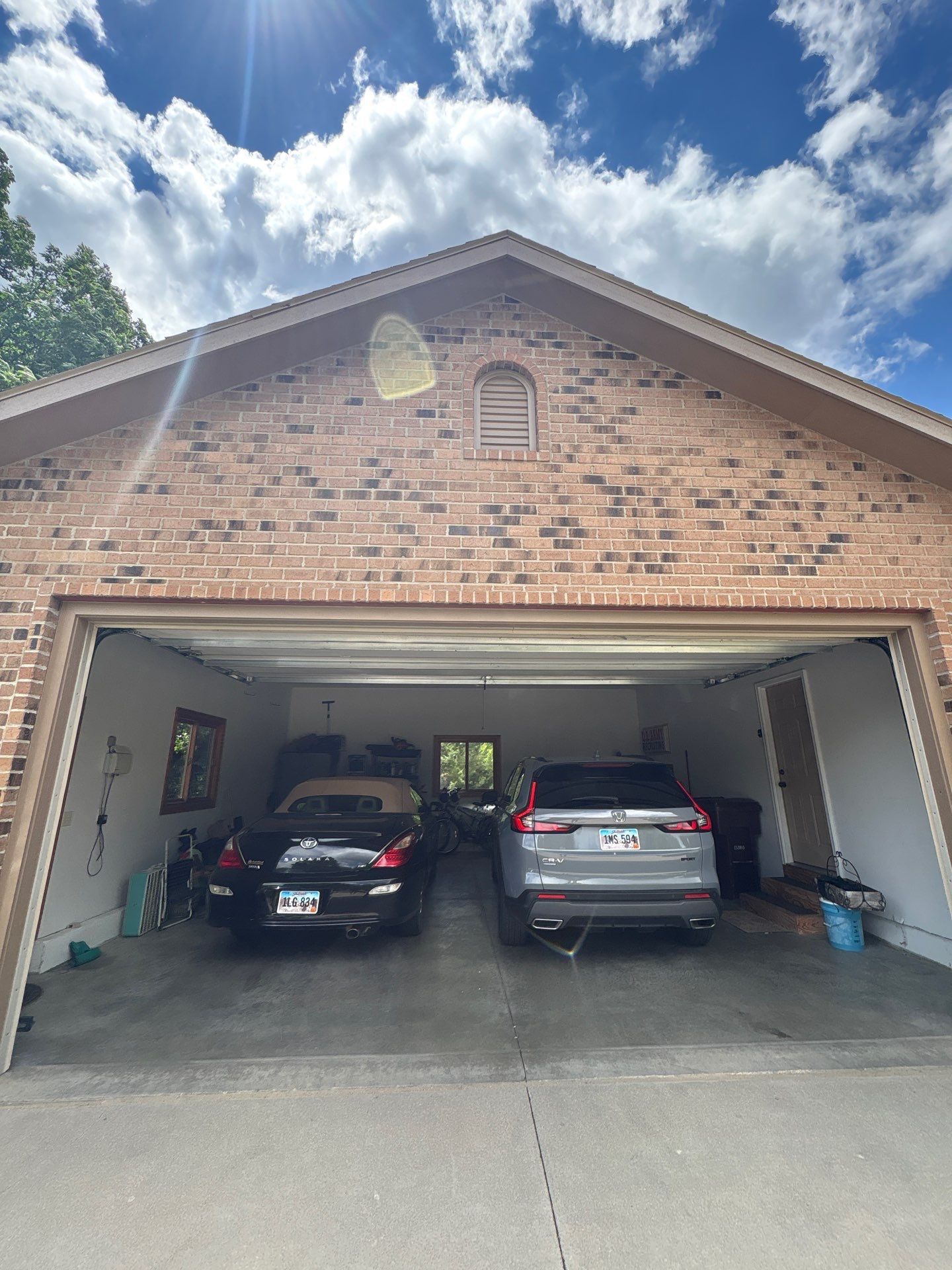 Multi-Story Residential Exterior Painting and Siding Refresh in Sioux Falls by Select Painting, Coatings & Garage Cabinets
