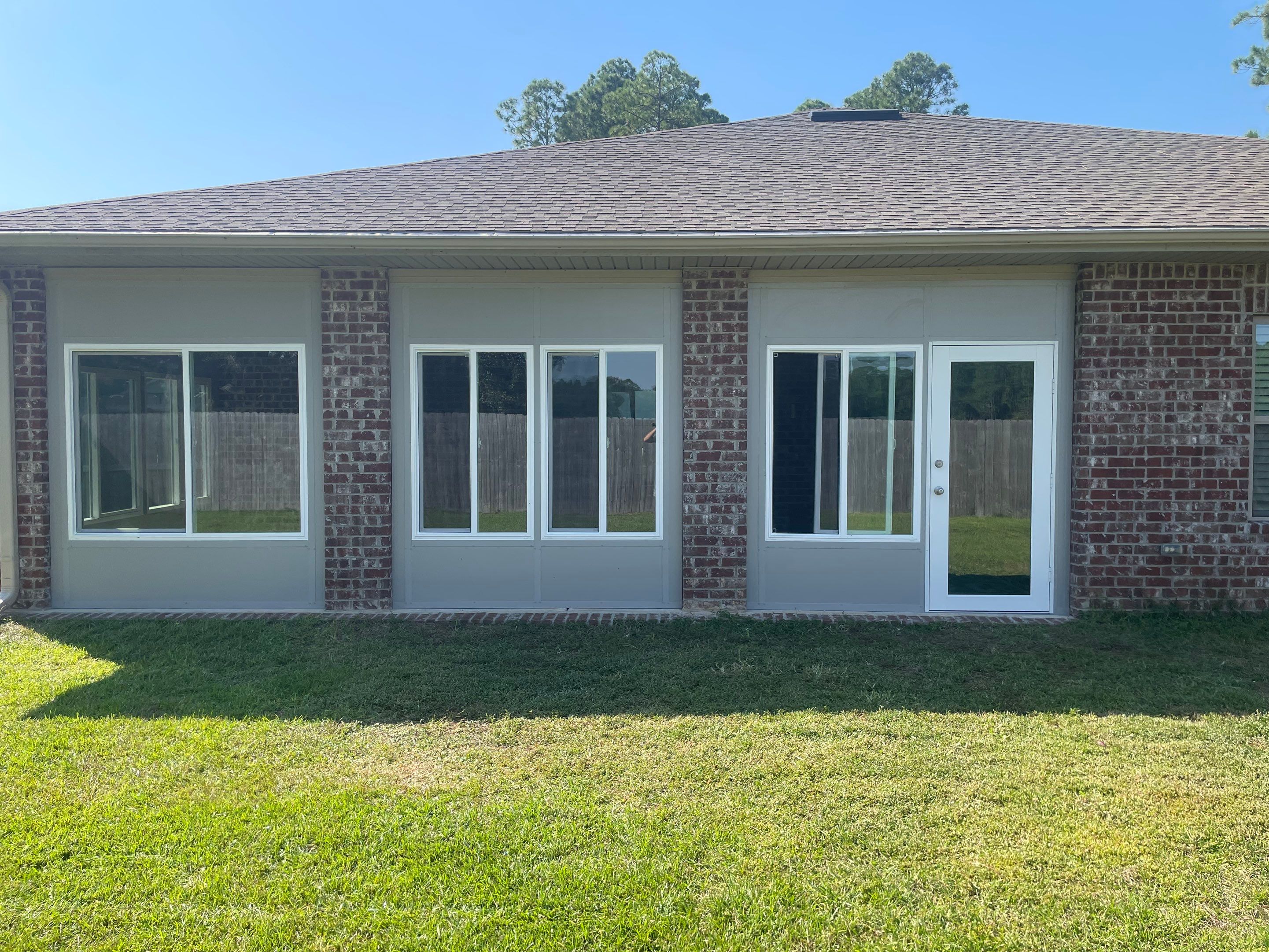 Glass Room Under Existing Patio Cover by Titan Sunrooms