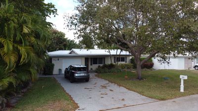 Residential Roofing Installation using 1" Nail strip metal roof
