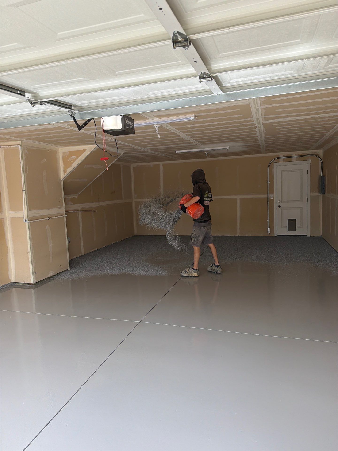 Garage Floor Coating Installation in Post Falls with Canfield Hybrid Flakes by Croc Coatings, LLC