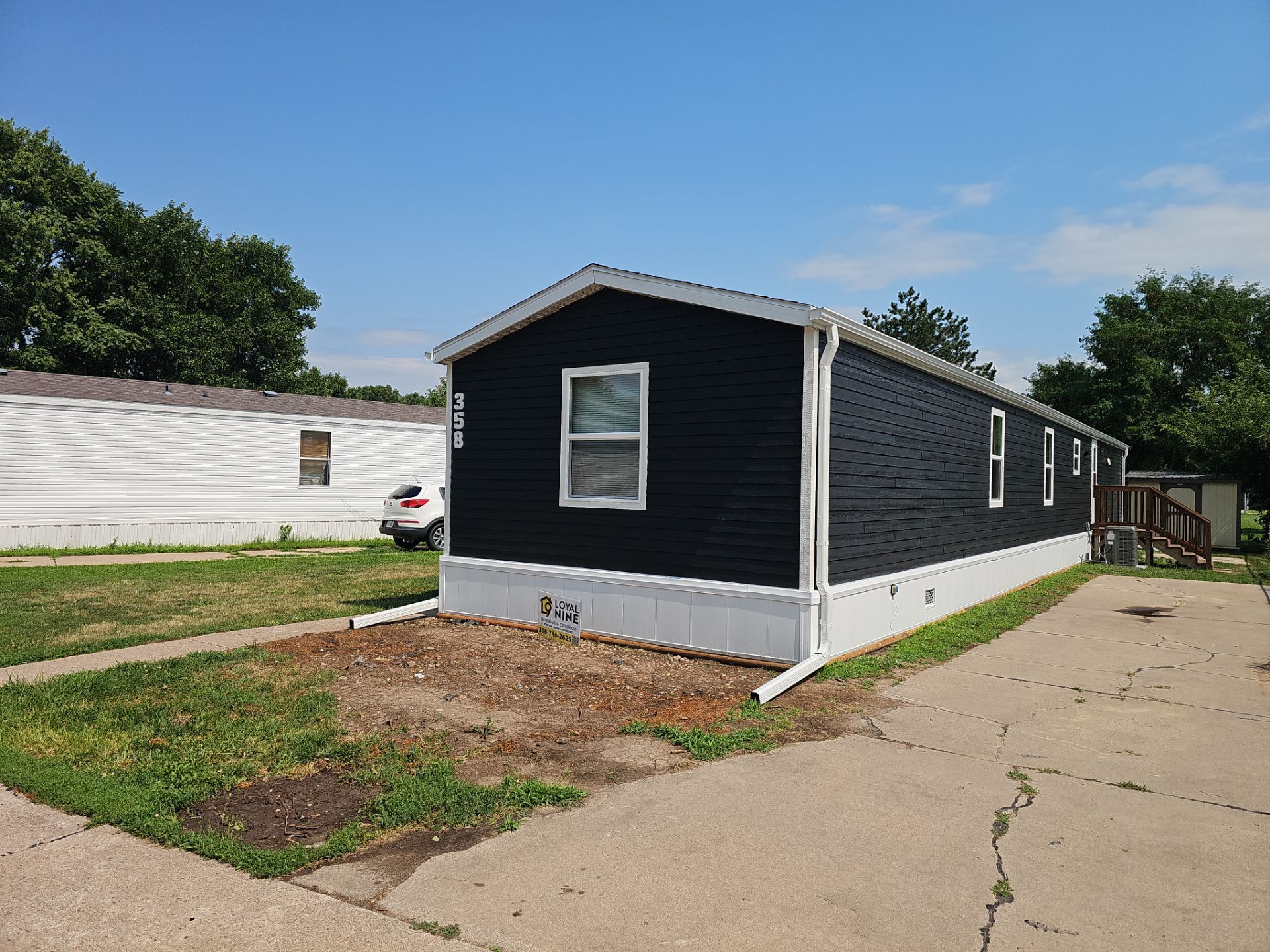 Protecting Another Kearney Home with a Complete Exterior Overhaul by Loyal Nine