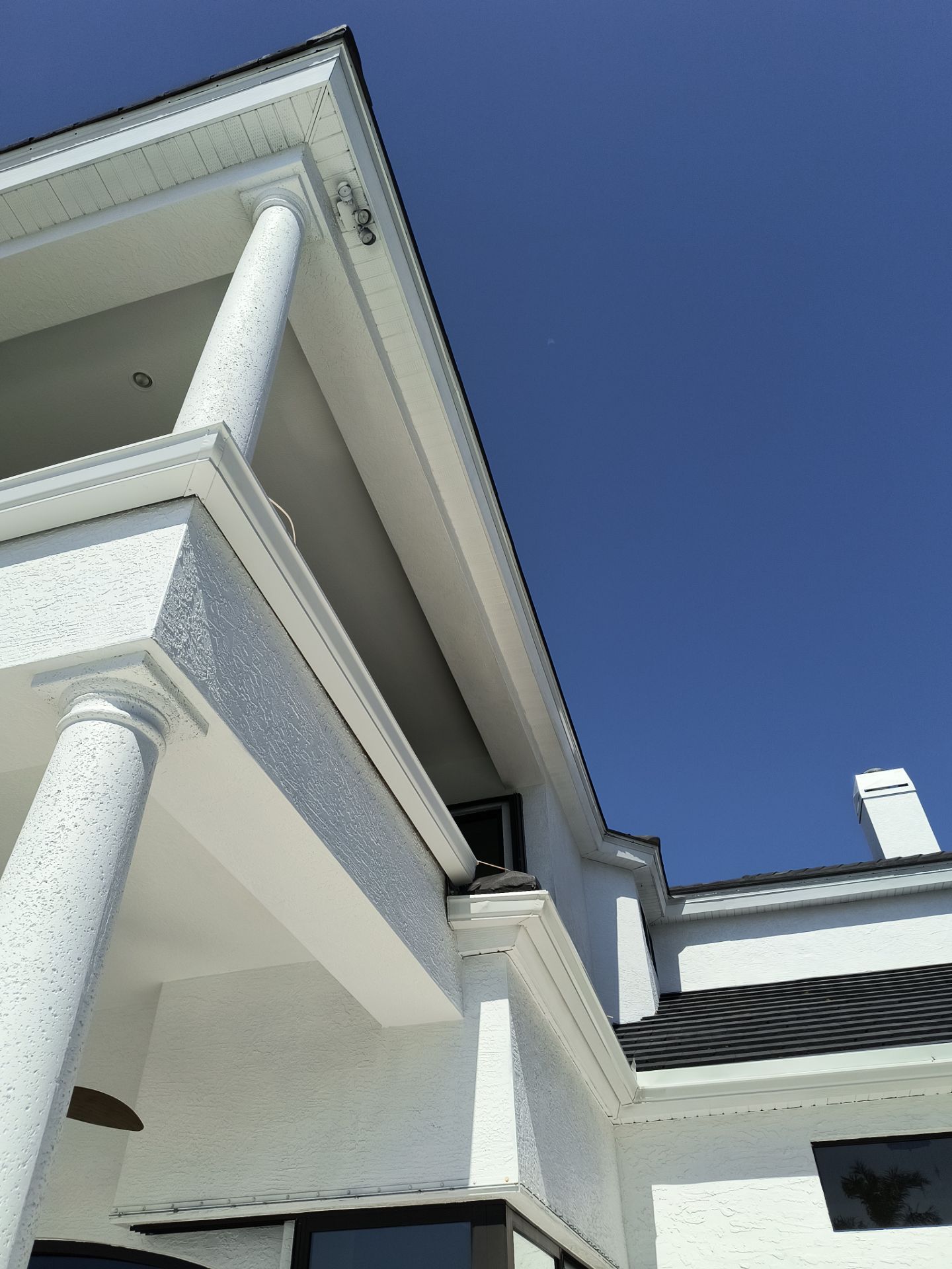 Custom Downspouts with Splash Guards in Sarasota FL by Gutter Professors