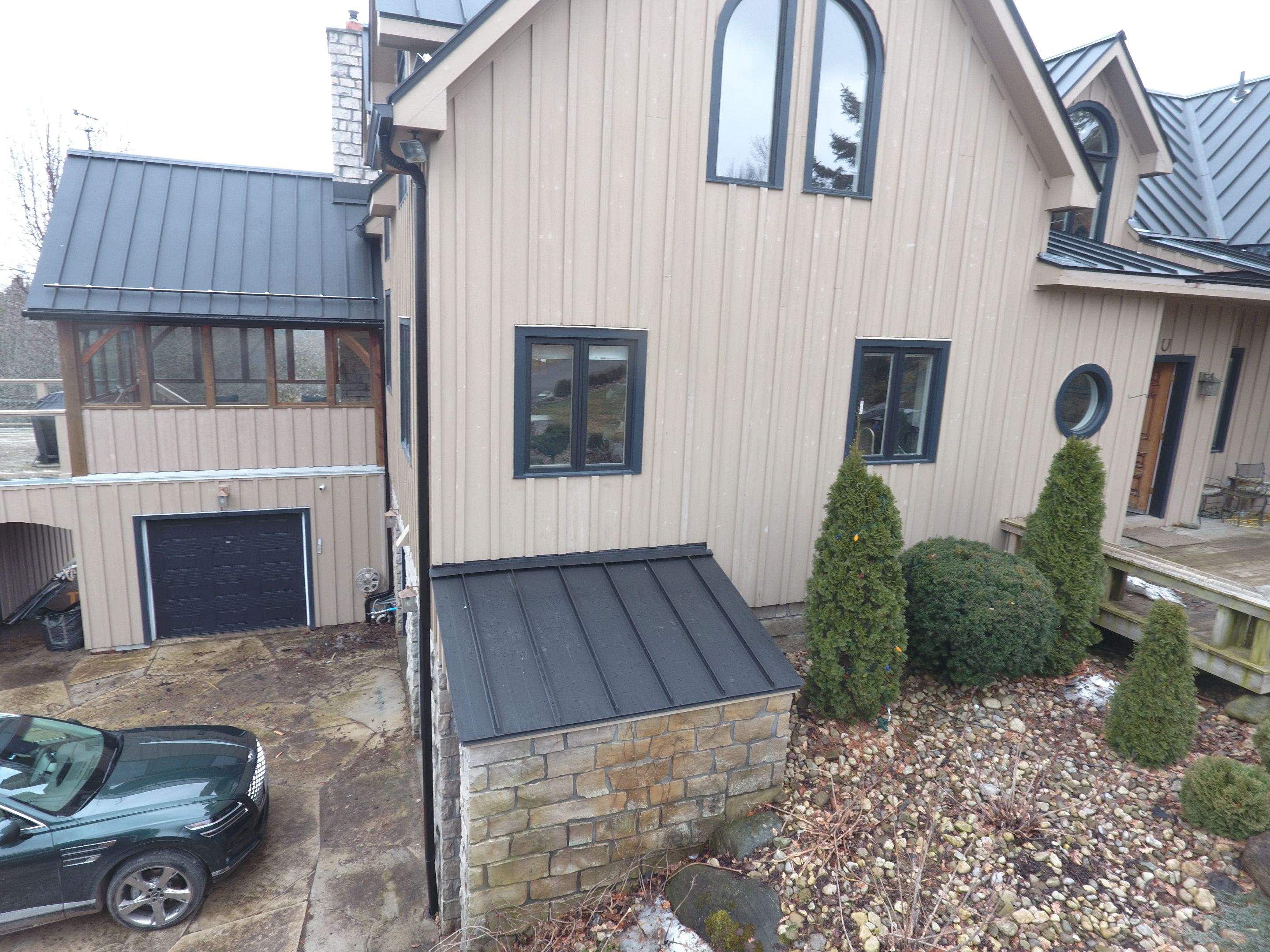 Residential Roofing Installation using 24 Ga Standing Seam Metal by Jay Carter Roofing & Sheet Metal