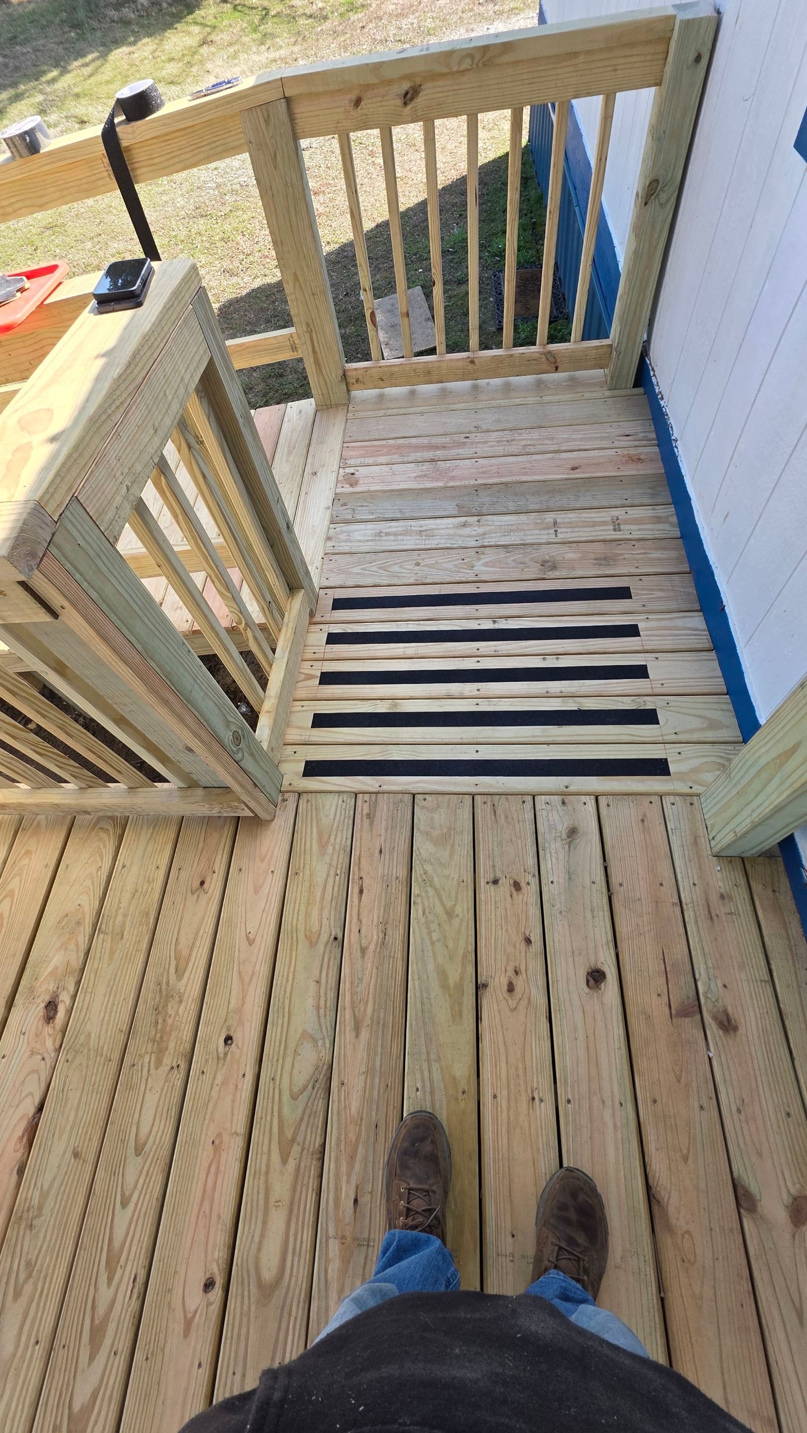 Covered Deck w/ ADA Ramp by In & Out Construction & Remodeling, LLC