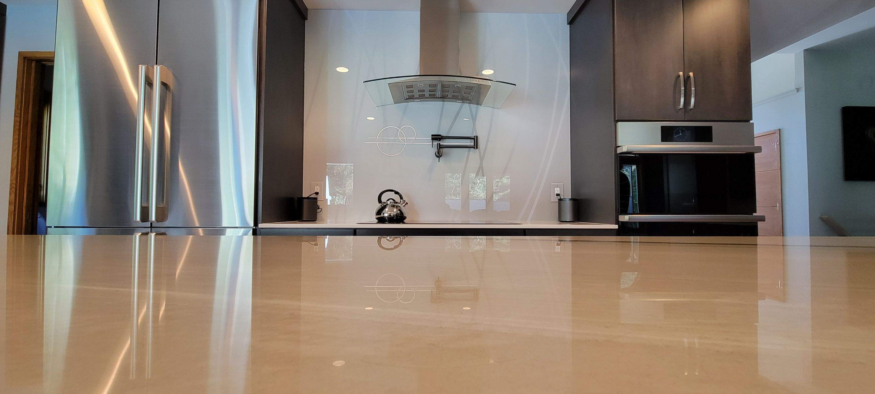 Kitchen Remodel using IMAGIO Misty Curves Solid Glass Backsplash by IMAGIO