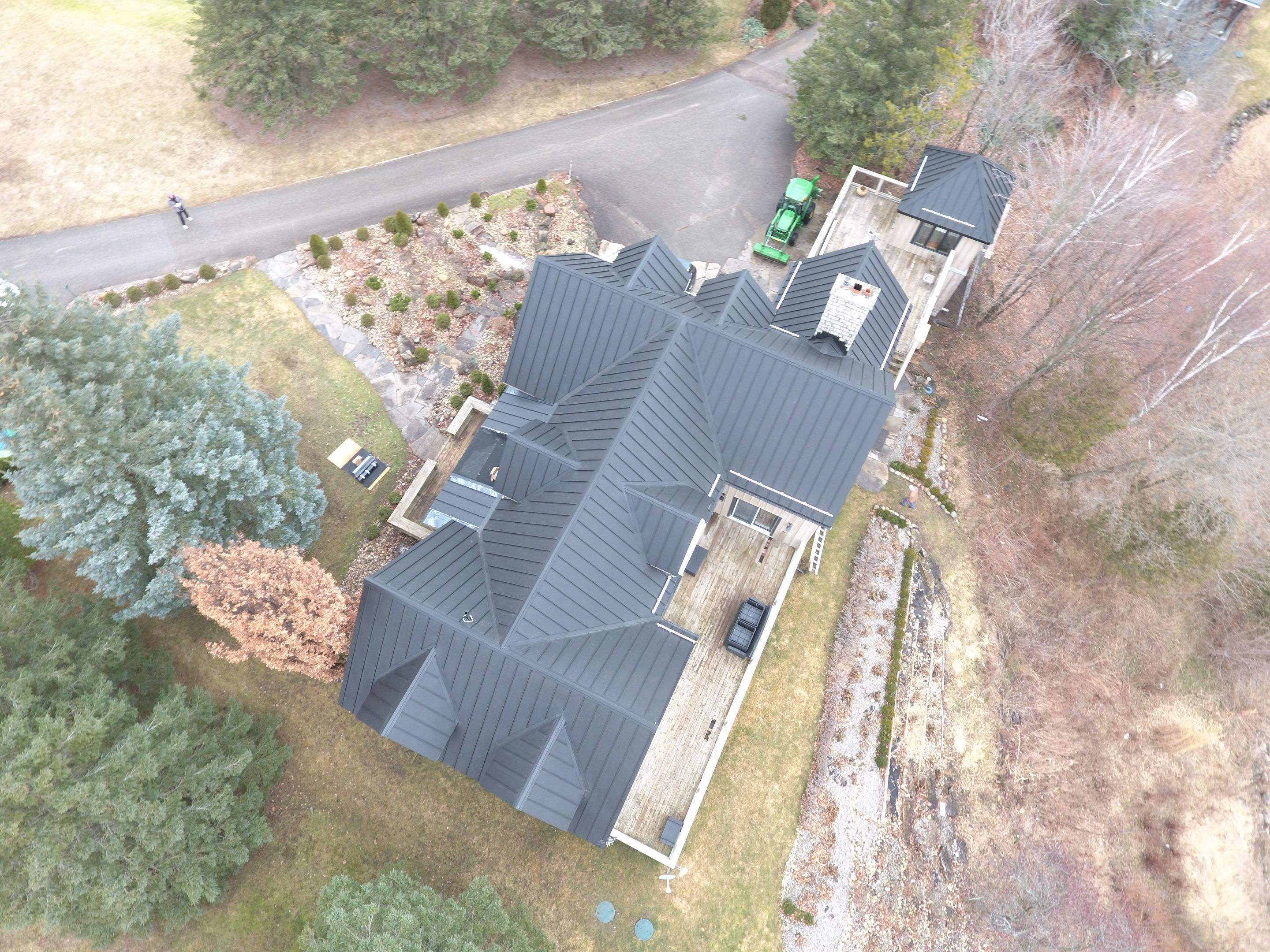 Residential Roofing Installation using 24 Ga Standing Seam Metal by Jay Carter Roofing & Sheet Metal