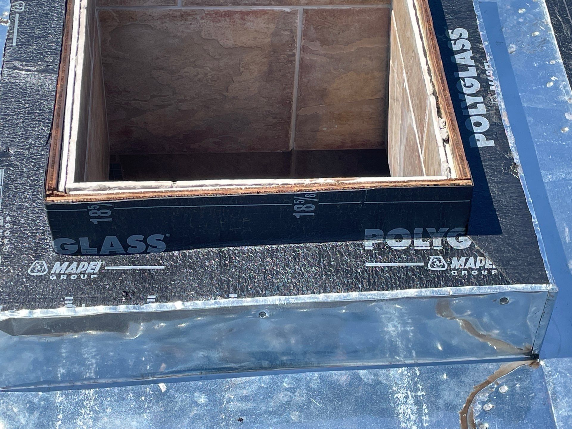 Island Torch Time by Bayfront Roofing and Construction